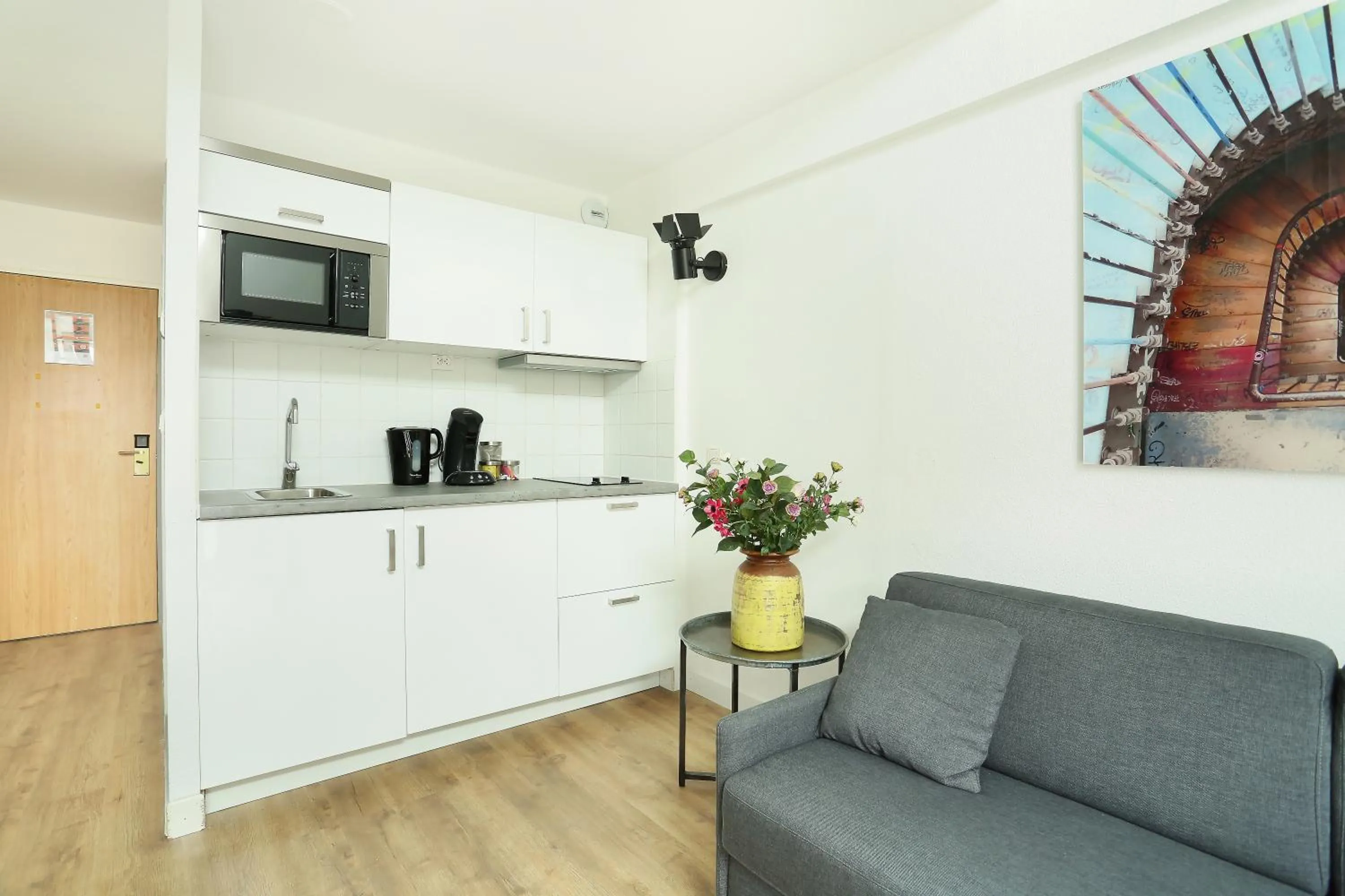 Kitchen or kitchenette in Les Lilas Serviced Apartments