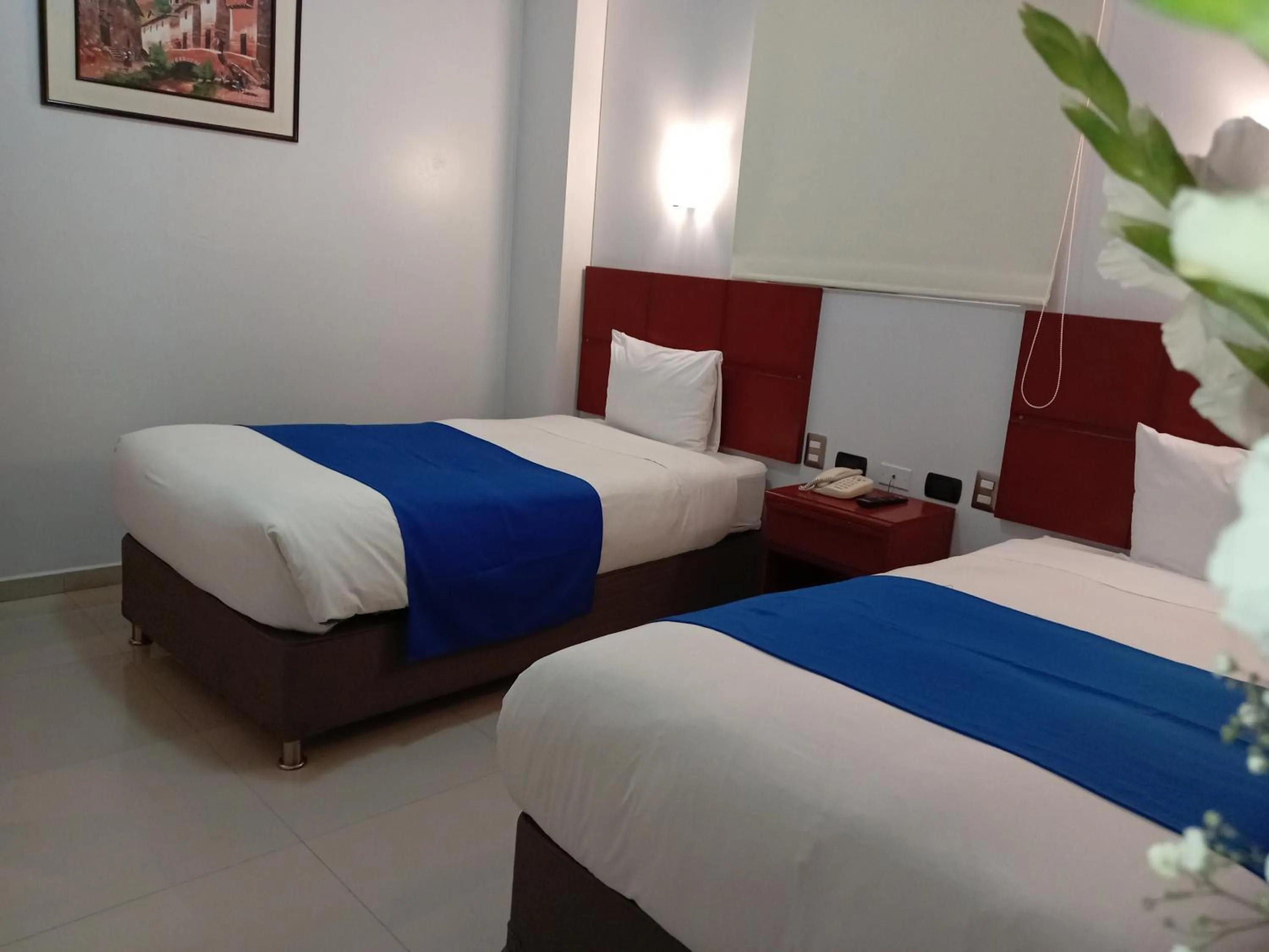 Bed in Aqua Hotel Cusco