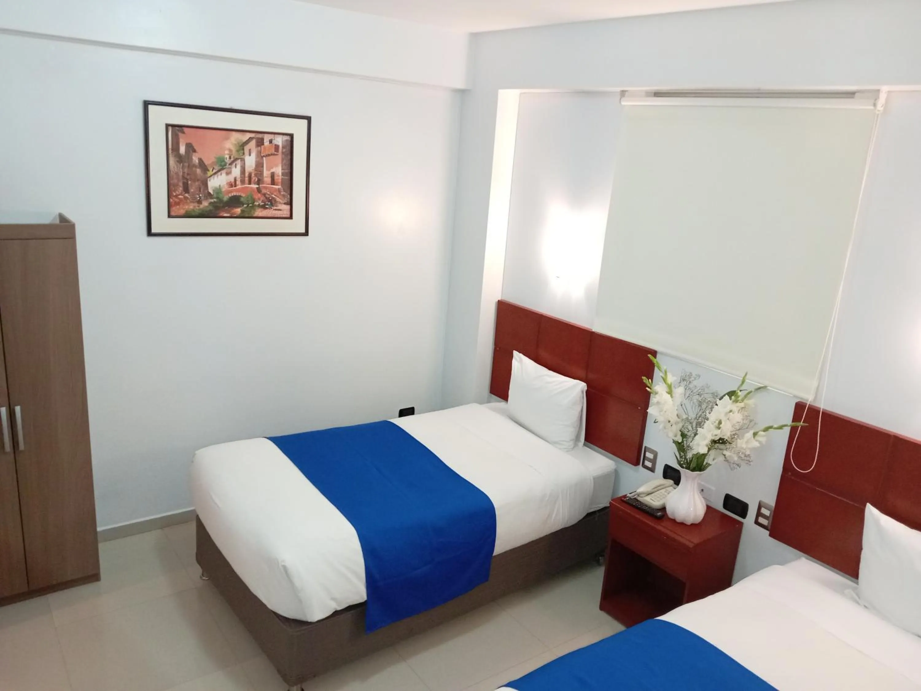 Bed in Aqua Hotel Cusco