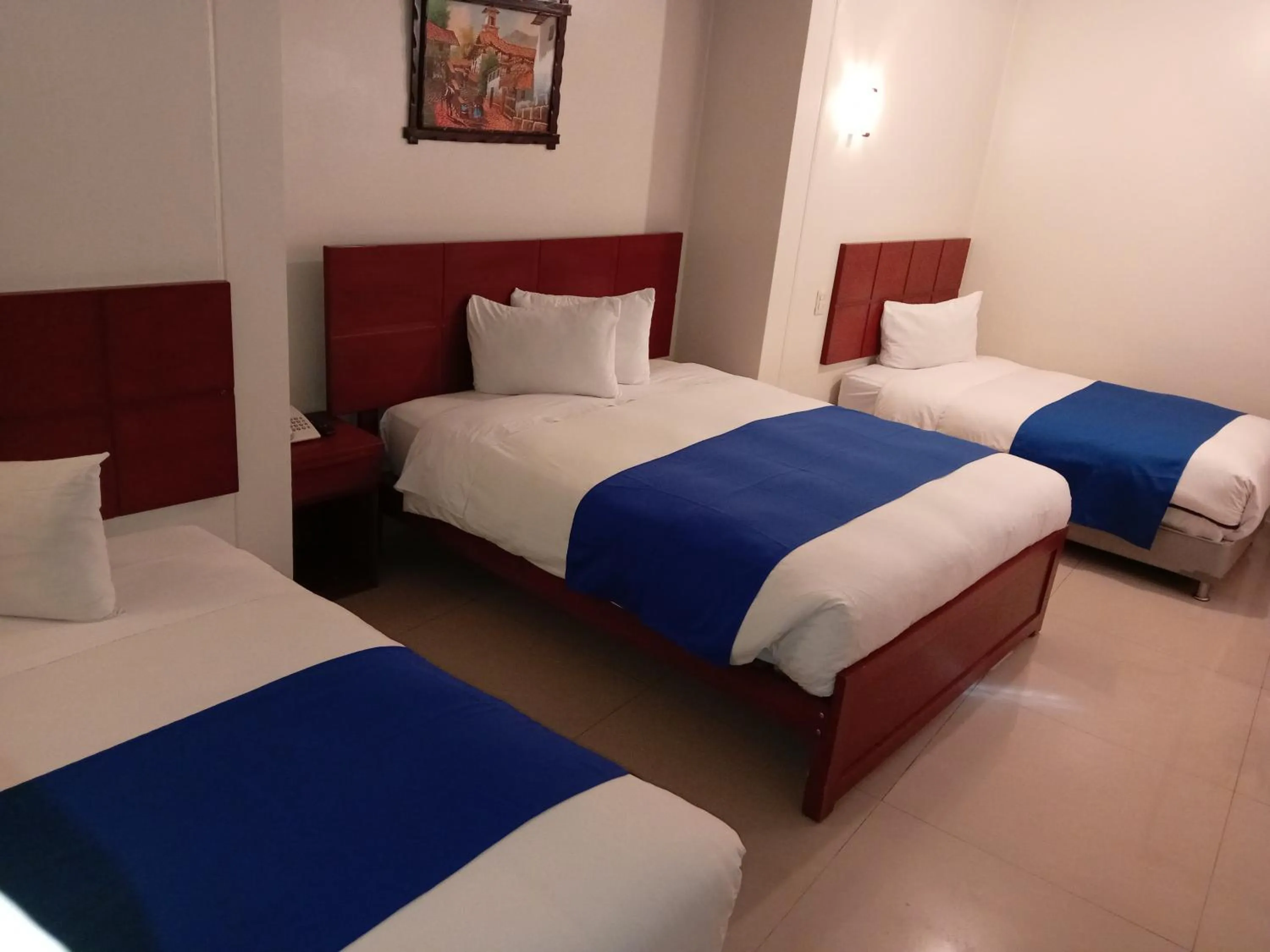 Bed in Aqua Hotel Cusco