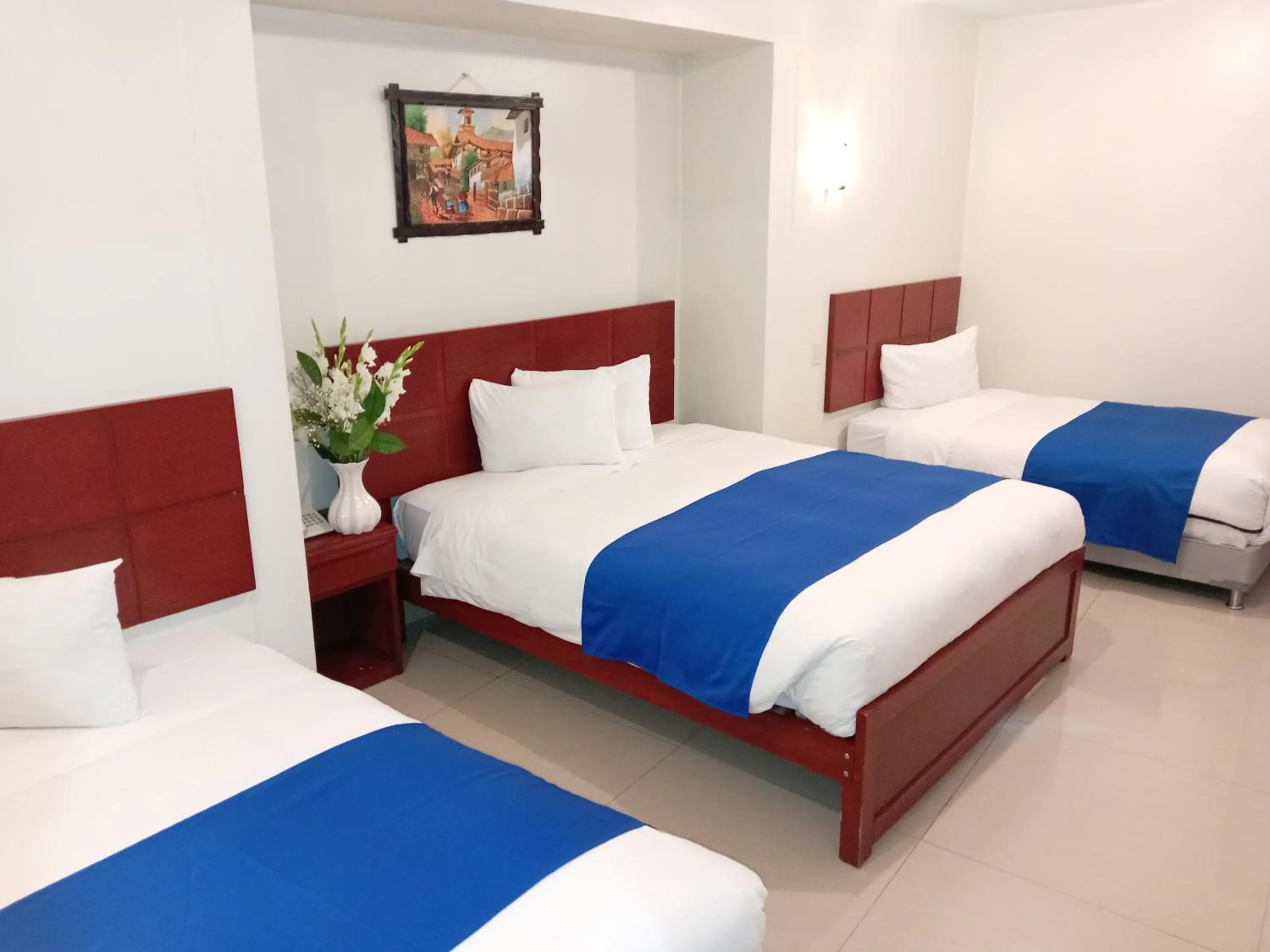 Bed in Aqua Hotel Cusco