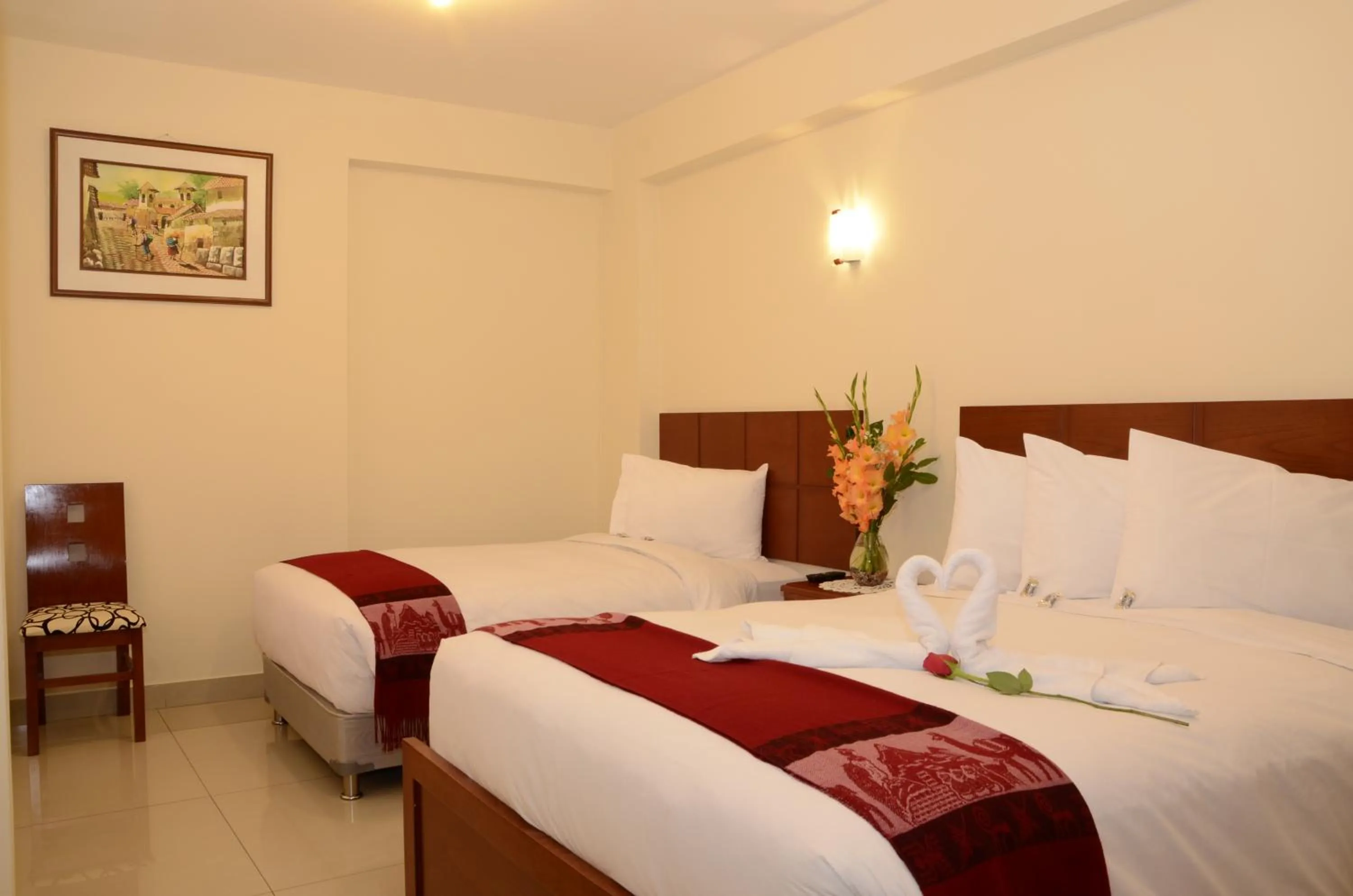 Bed in Aqua Hotel Cusco