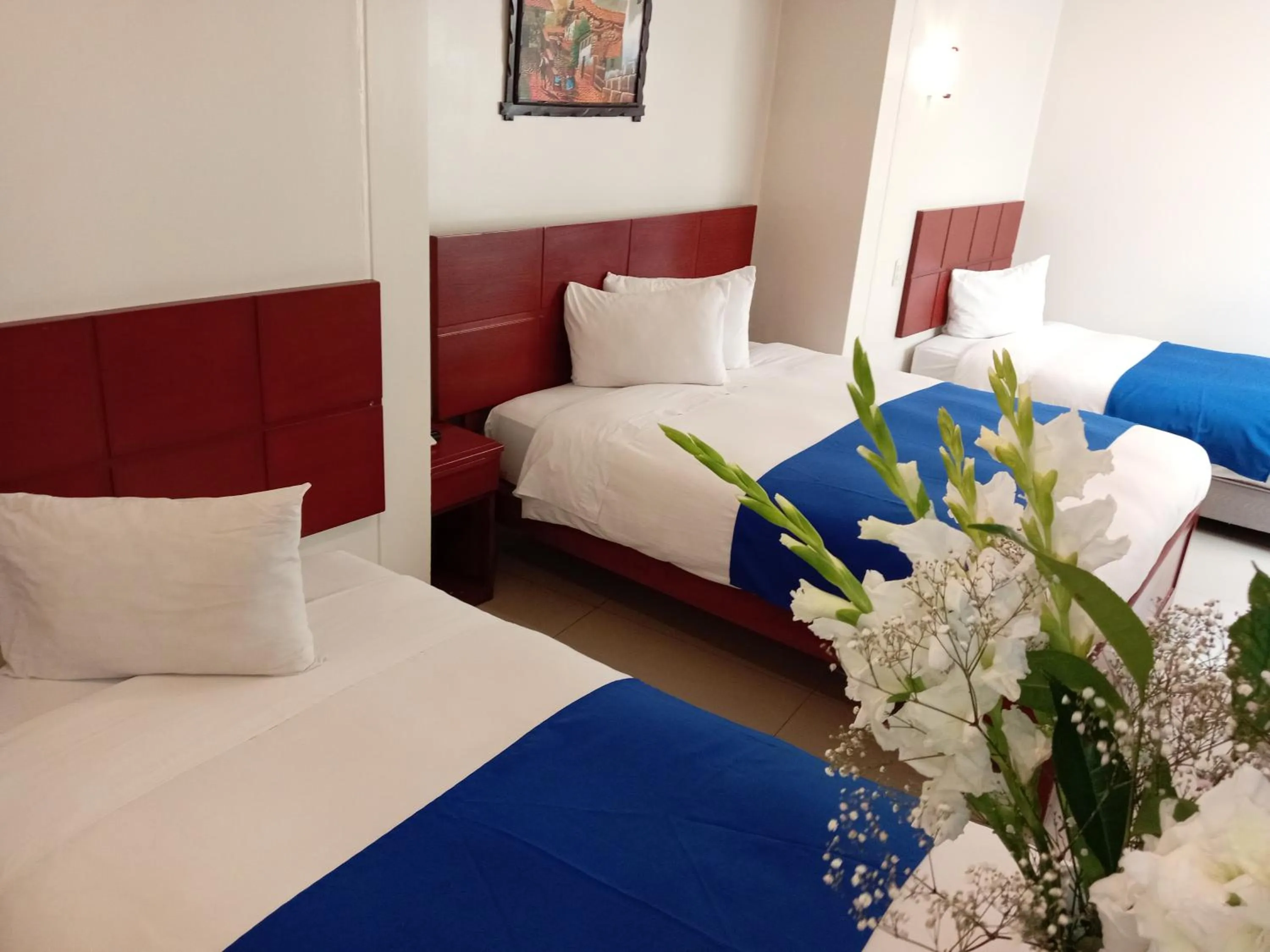 Bed in Aqua Hotel Cusco