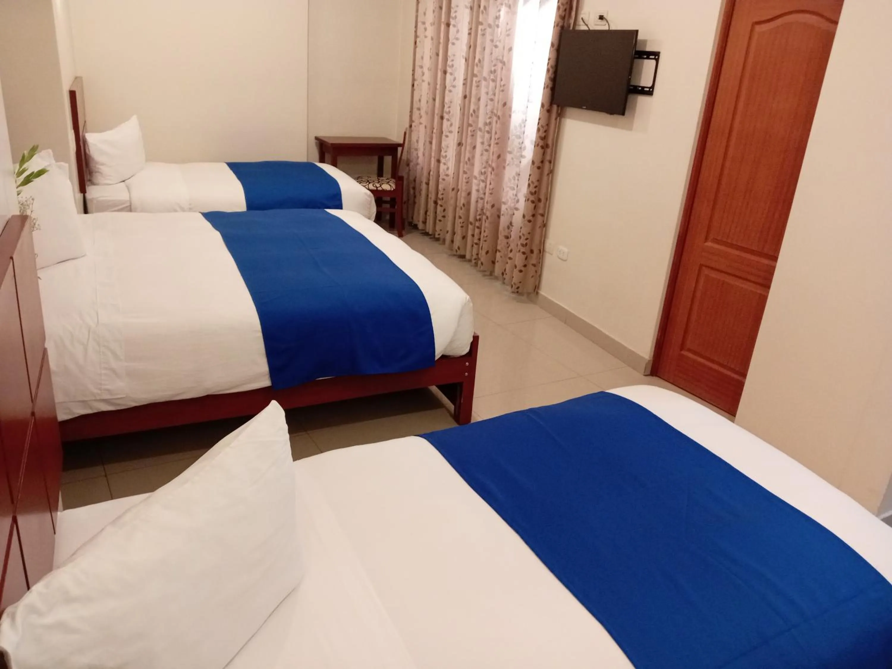 Bed in Aqua Hotel Cusco