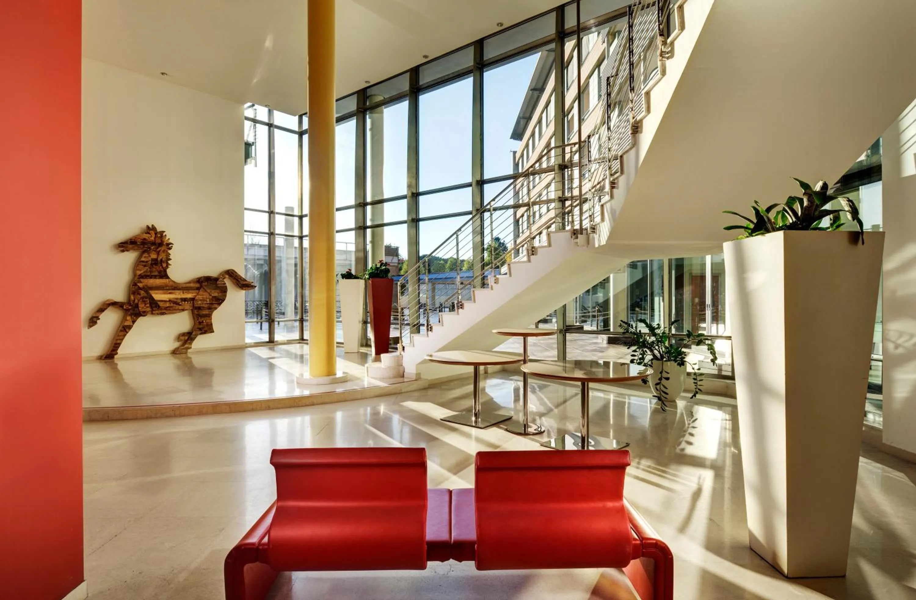 Lobby or reception in UNAHOTELS Varese