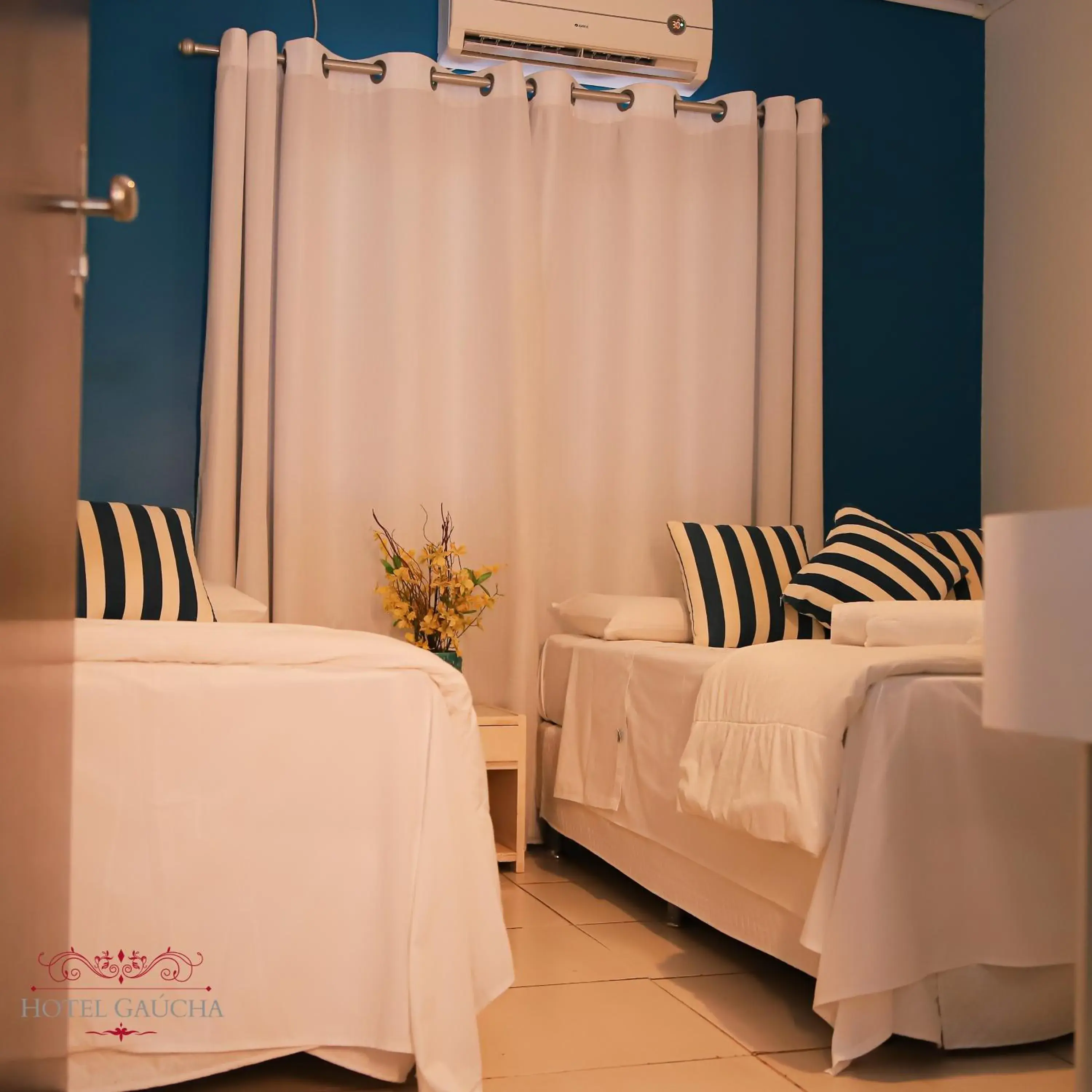 Budget Triple Room - single occupancy in Hotel Gaucha Budget Triple Room - single occupancy in Hotel Gaucha
