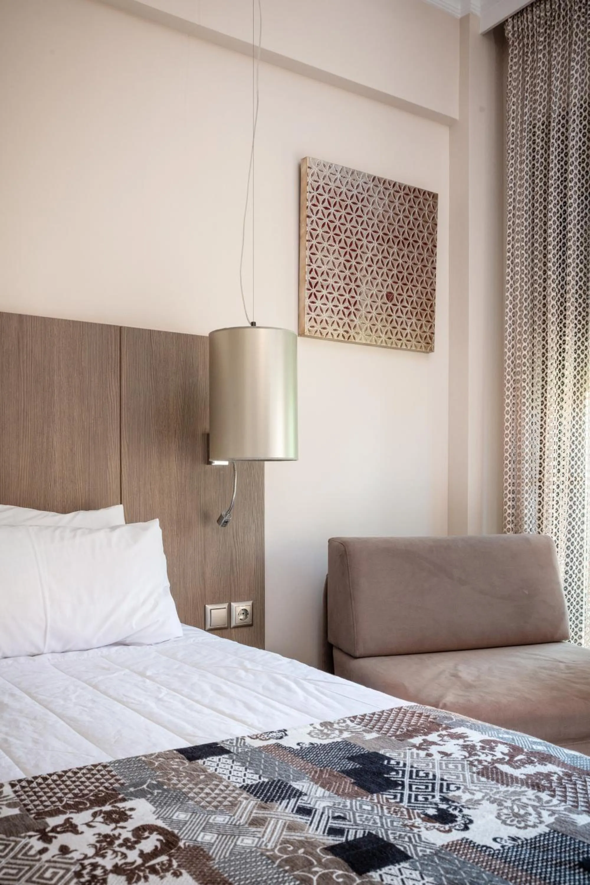 Bed in Royalty Suites Seaside