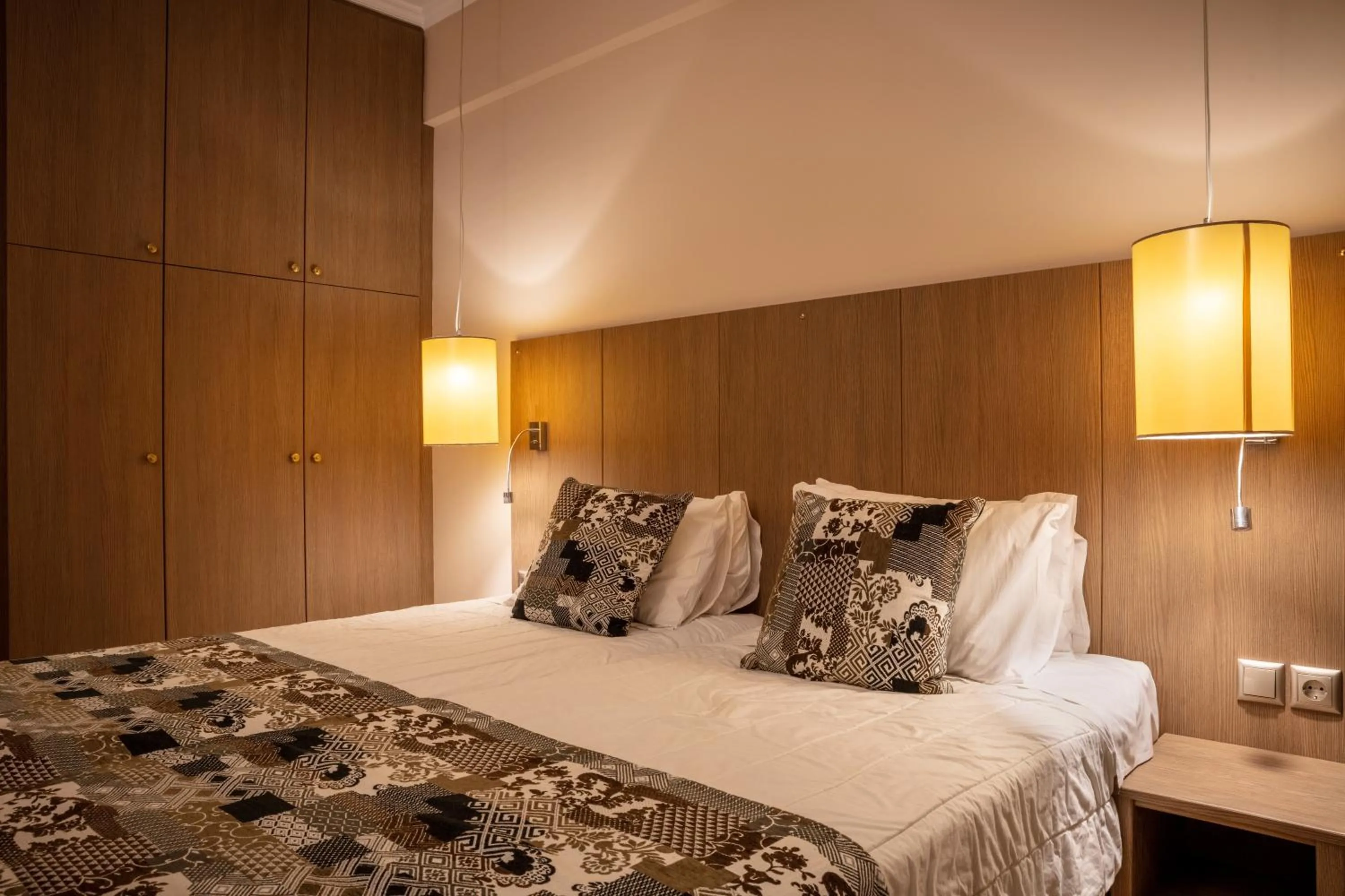 Bed in Royalty Suites Seaside