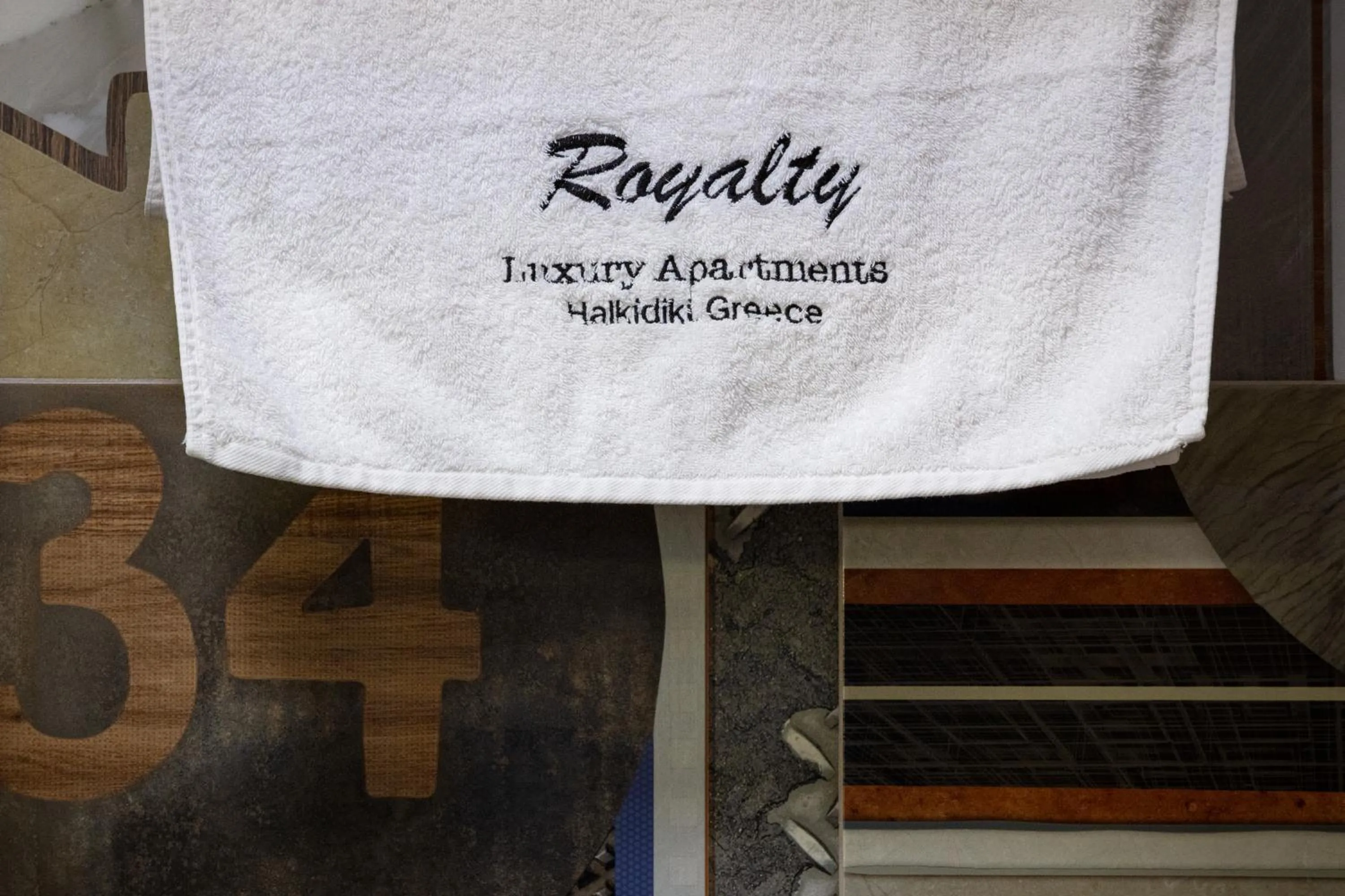Property logo or sign in Royalty Suites Seaside