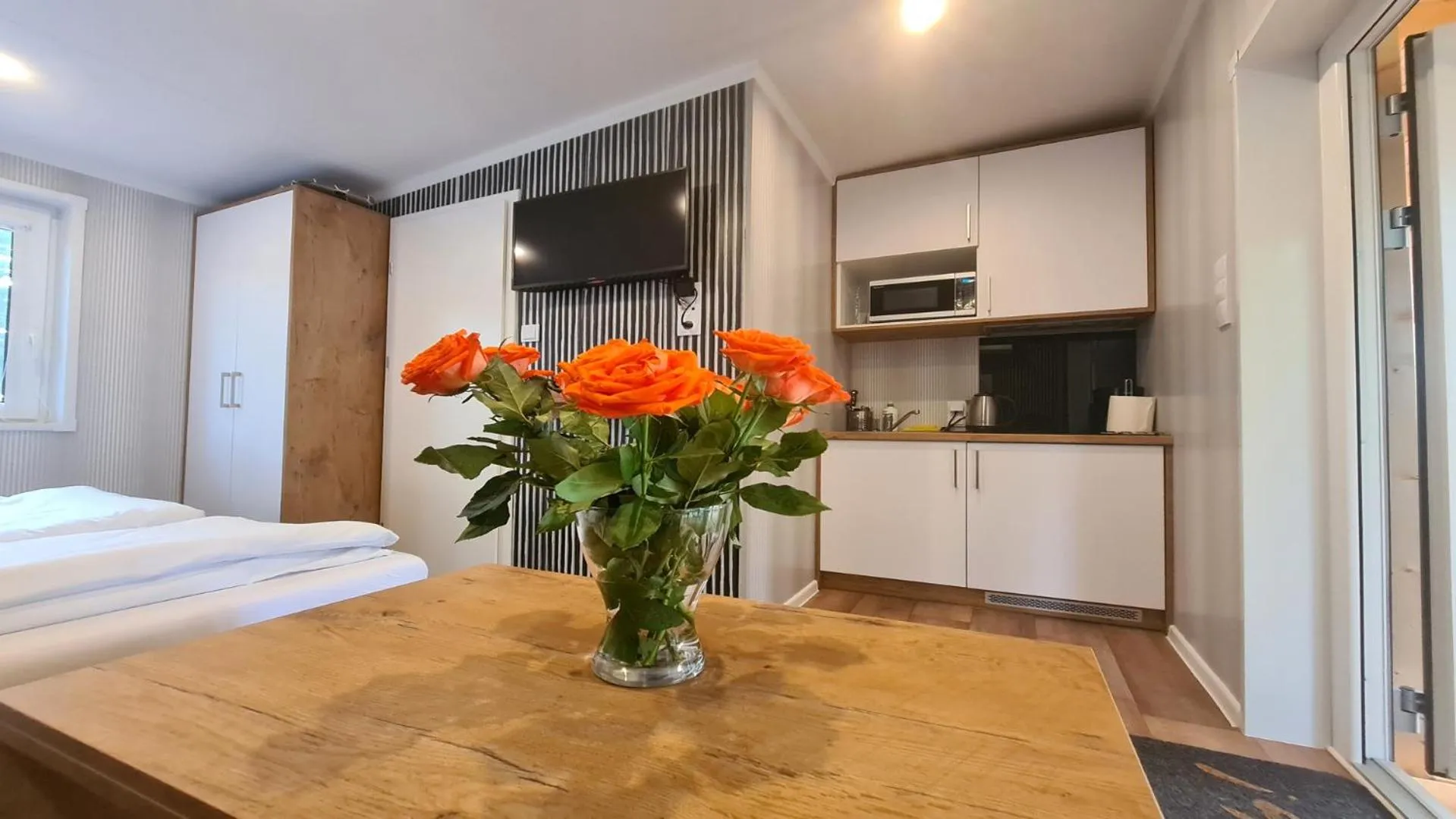 Kitchen or kitchenette, Bed in Hotel Tajty