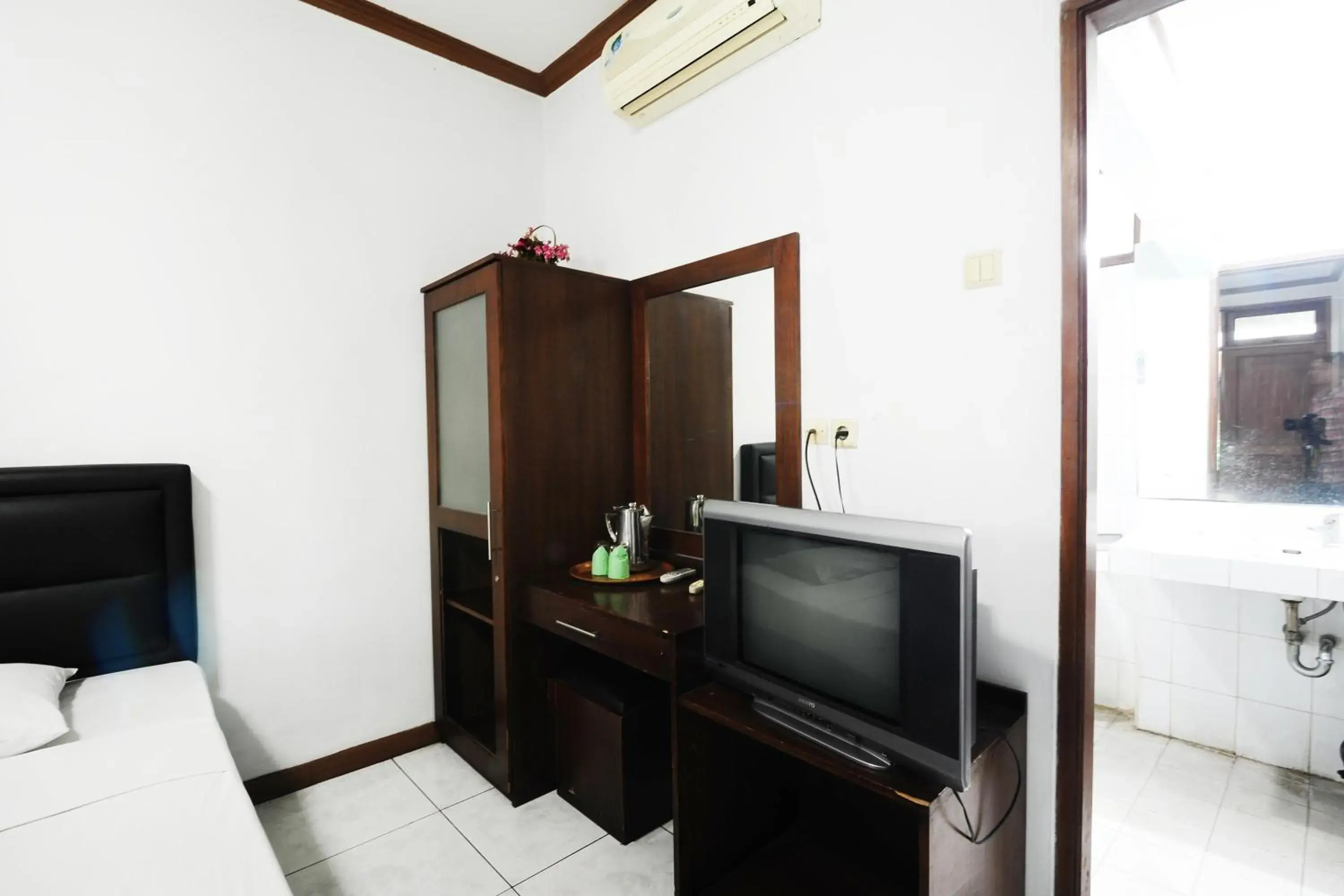 Bedroom in De'Qur Hotel Bandung Bedroom in De'Qur Hotel Bandung