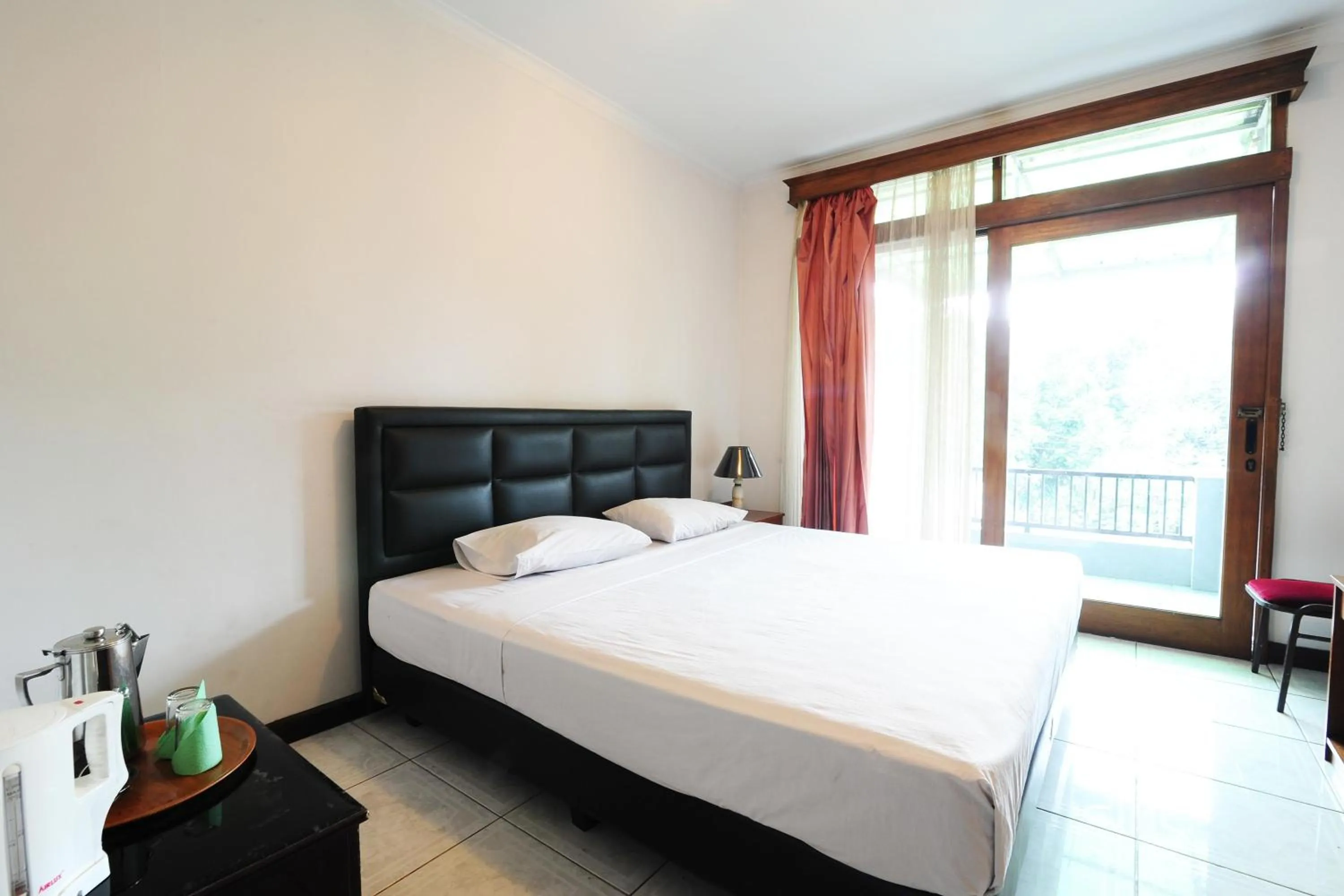 Bed in De'Qur Hotel Bandung