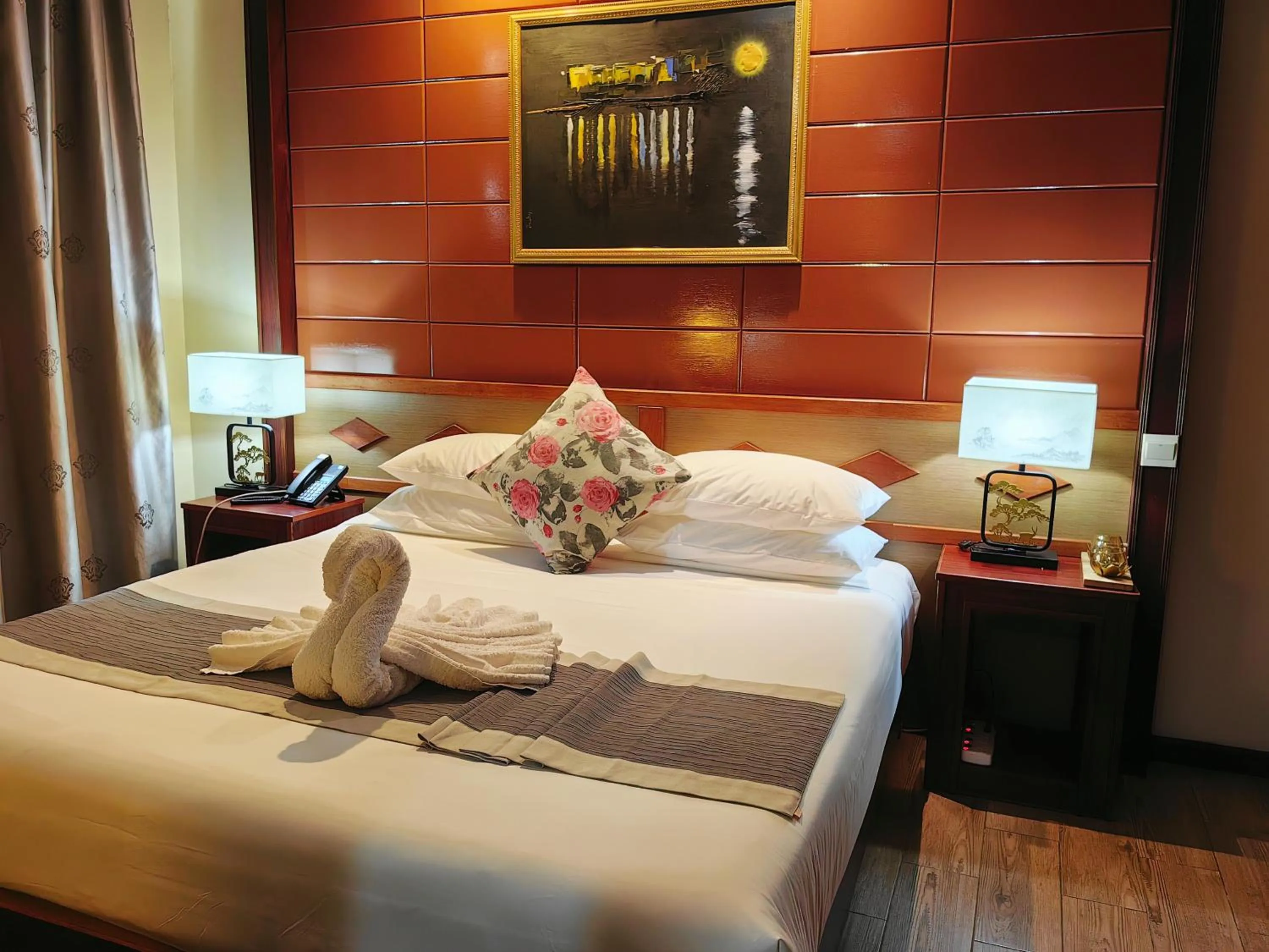 Bed in Great Wall Hotel