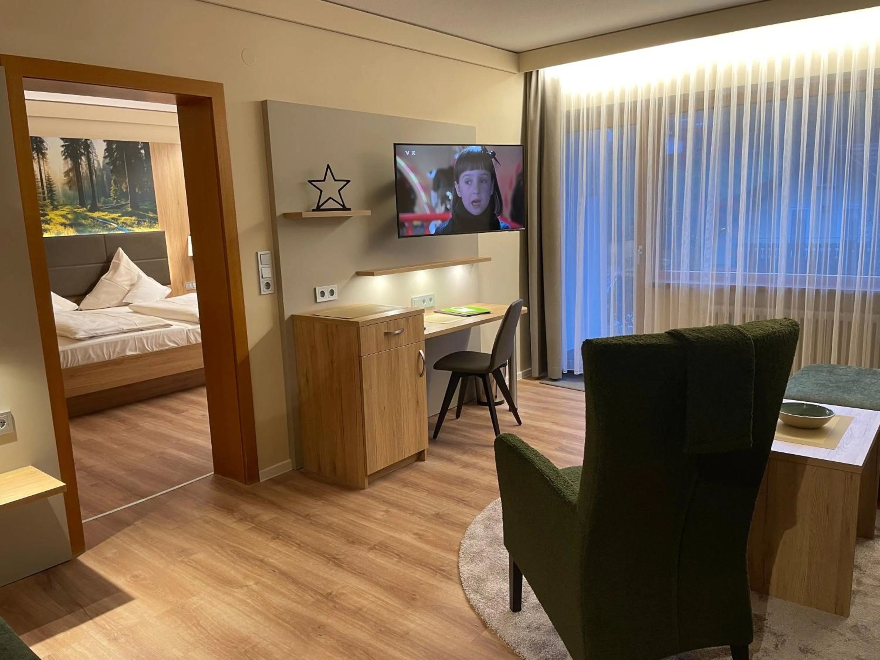 Living room, Bed in Hotel Waldlust