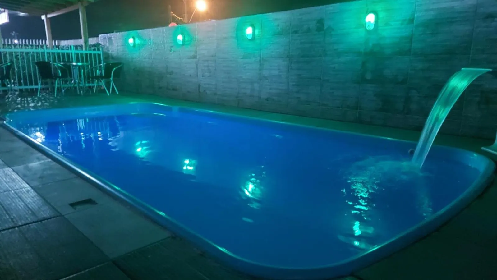 Swimming pool in Pousada Ilha do Itacolomi Com Piscina Proximo do Beto Carrero