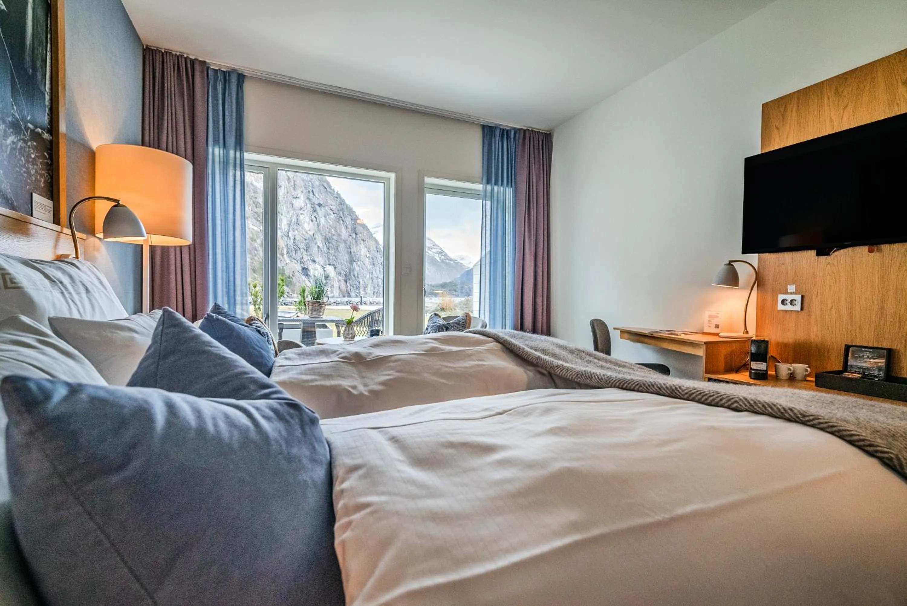 Bed in Valldal Fjordhotell - by Classic Norway Hotels