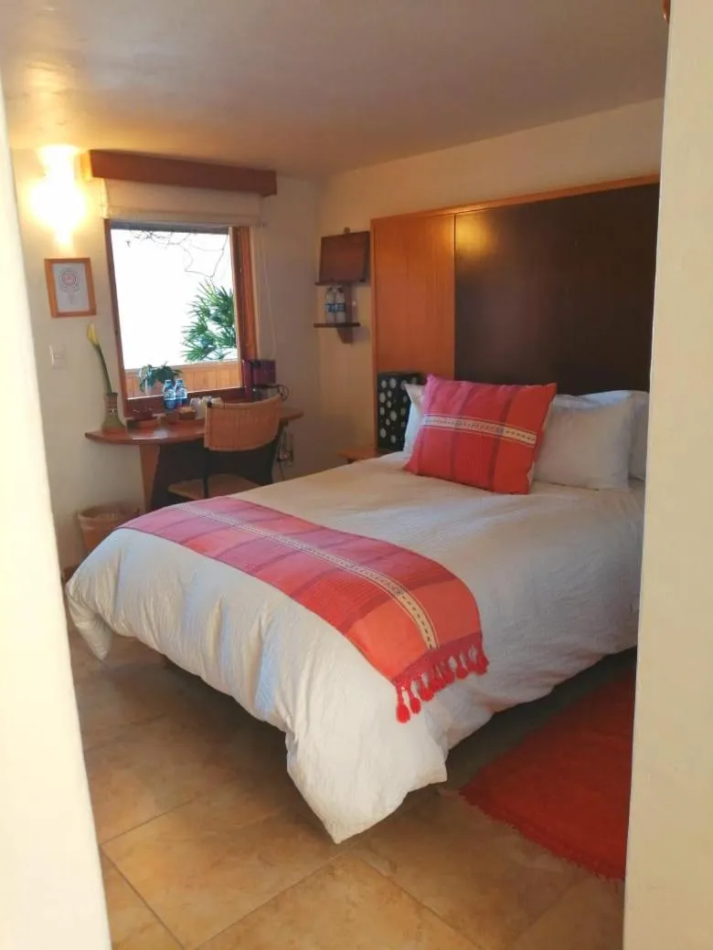 Bed in Casa Tsaya Hotel Boutique