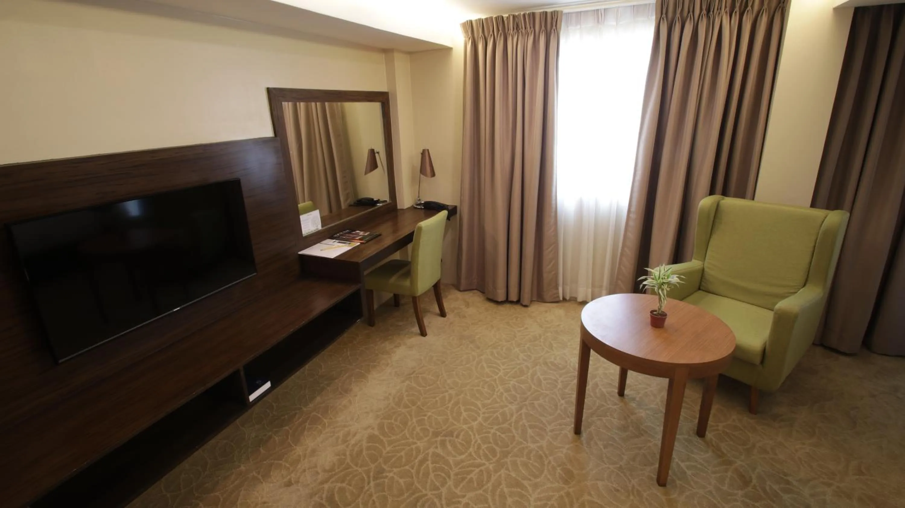 Photo of the whole room in Top Star Hotel