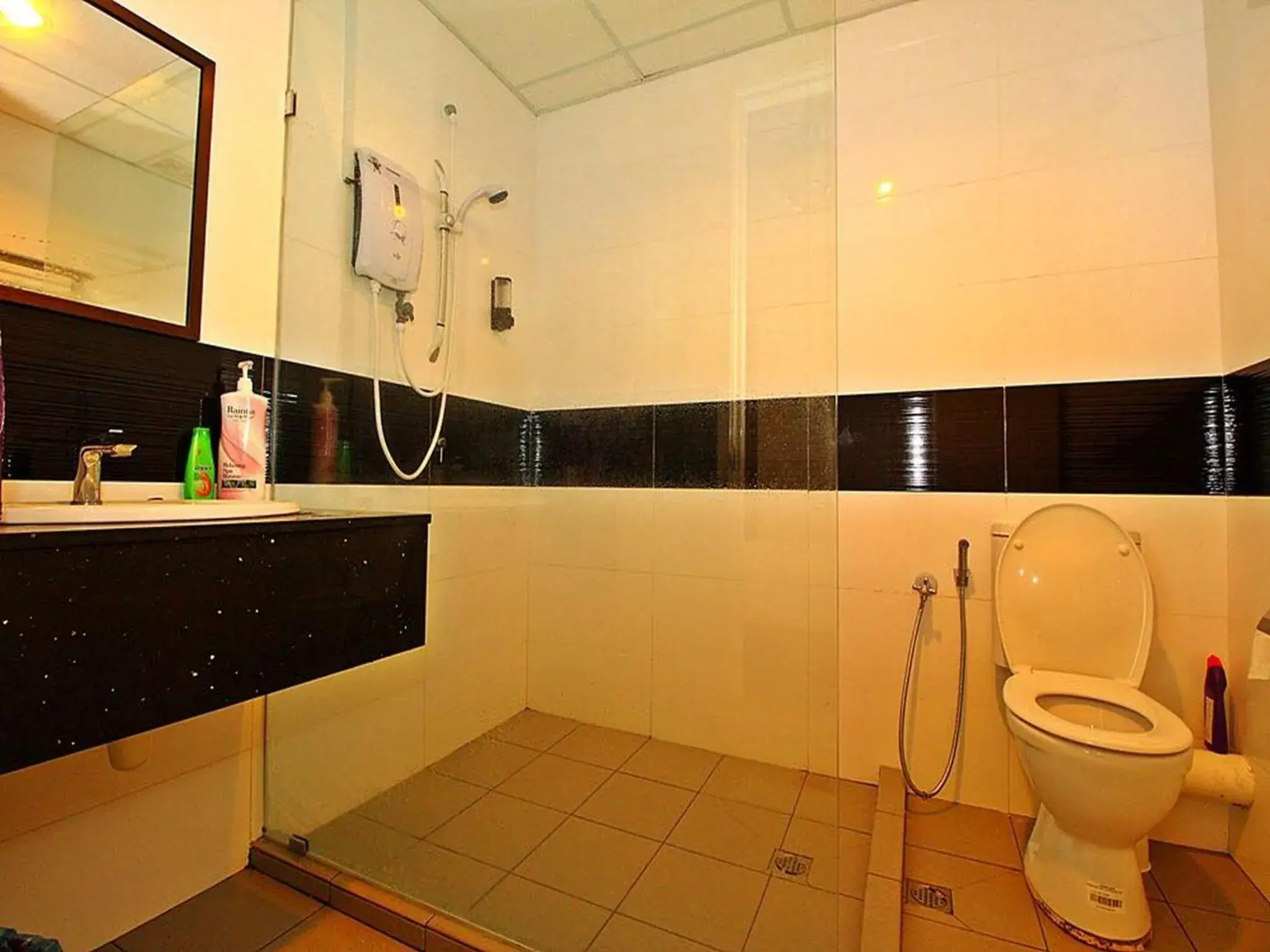 Bathroom in Merlene Suites at Mansion One Formerly know as Mansion One Suites Bathroom in Merlene Suites at Mansion One Formerly know as Mansion One Suites