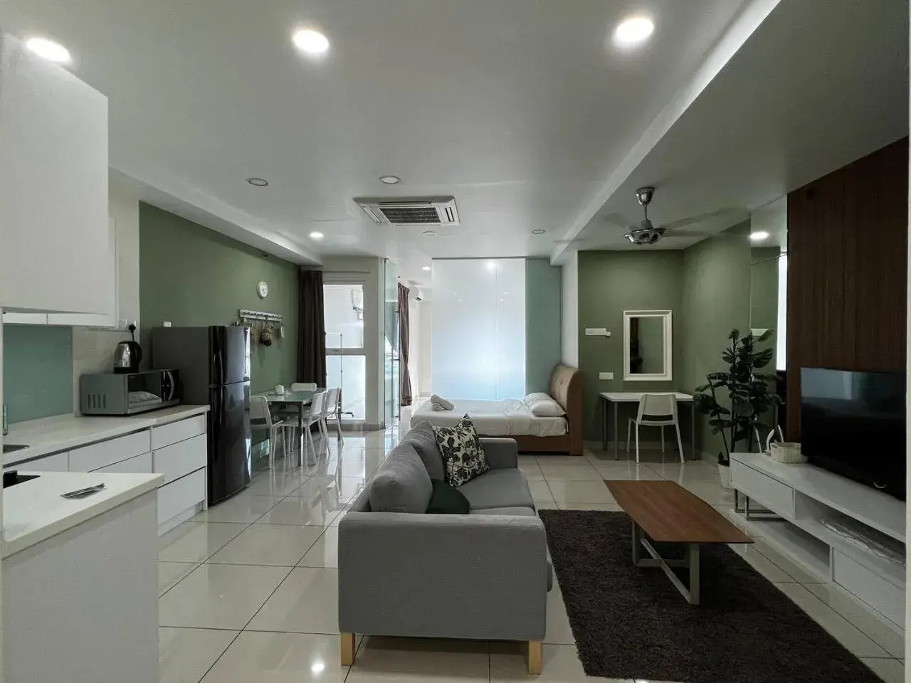 Living room in Merlene Suites at Mansion One Formerly know as Mansion One Suites Living room in Merlene Suites at Mansion One Formerly know as Mansion One Suites