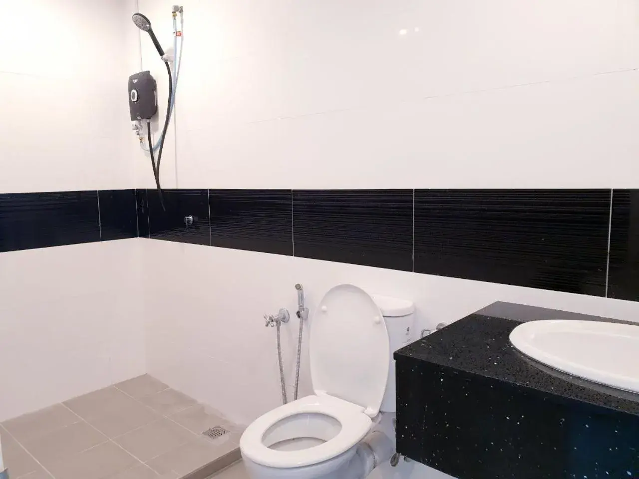 Bathroom in Merlene Suites at Mansion One Formerly know as Mansion One Suites Bathroom in Merlene Suites at Mansion One Formerly know as Mansion One Suites