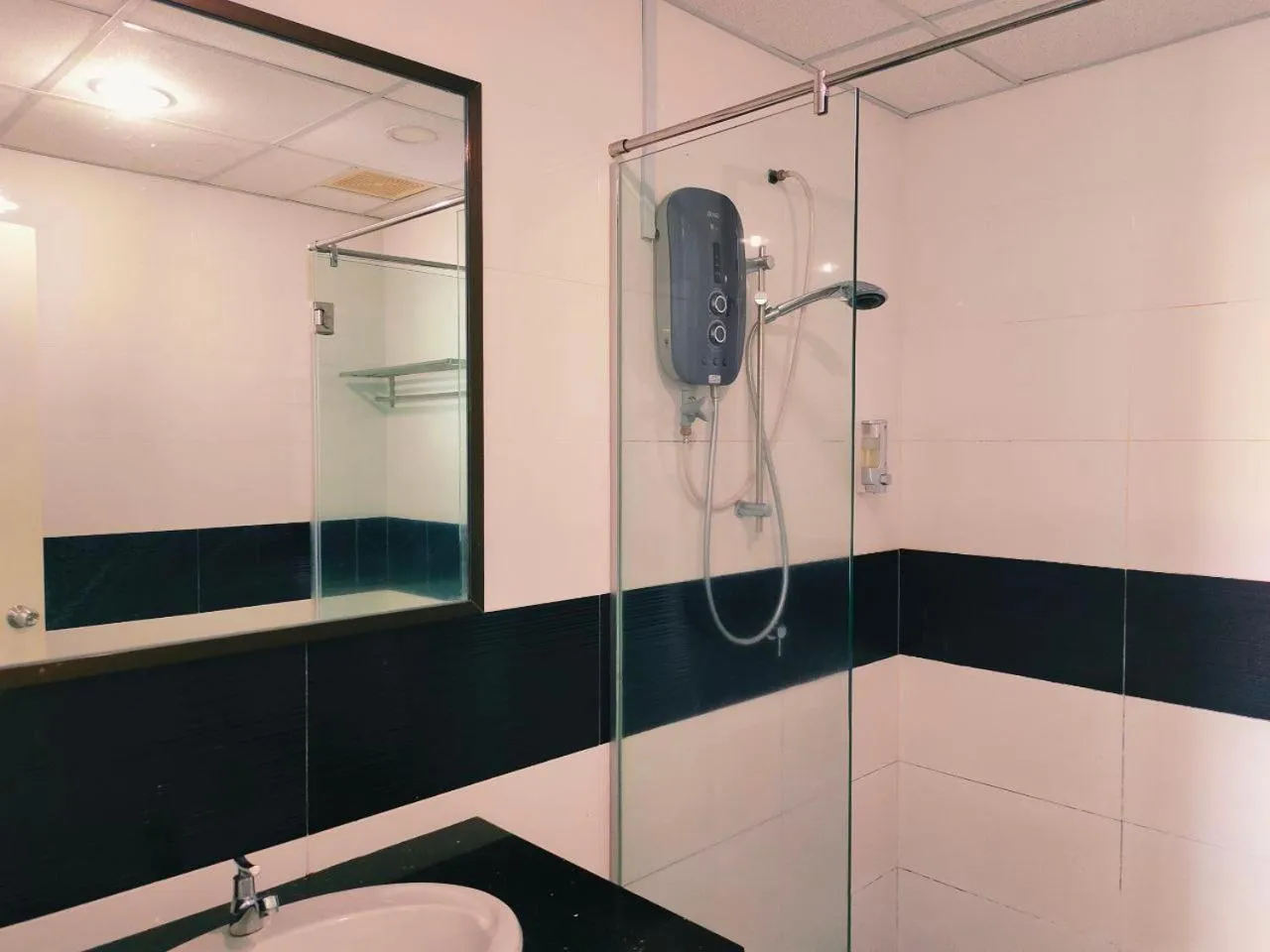 Bathroom in Merlene Suites at Mansion One Formerly know as Mansion One Suites