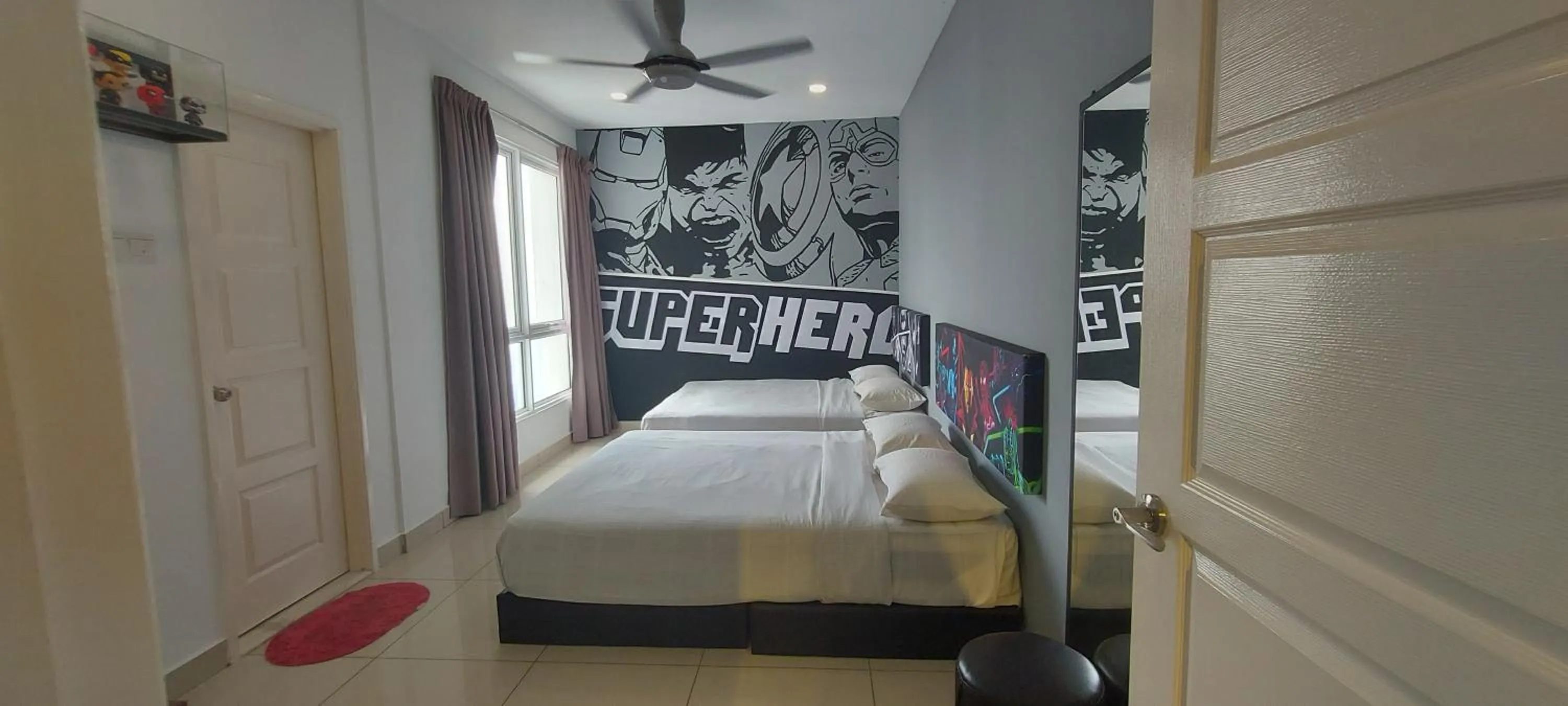 Bed in Merlene Suites at Mansion One Formerly know as Mansion One Suites