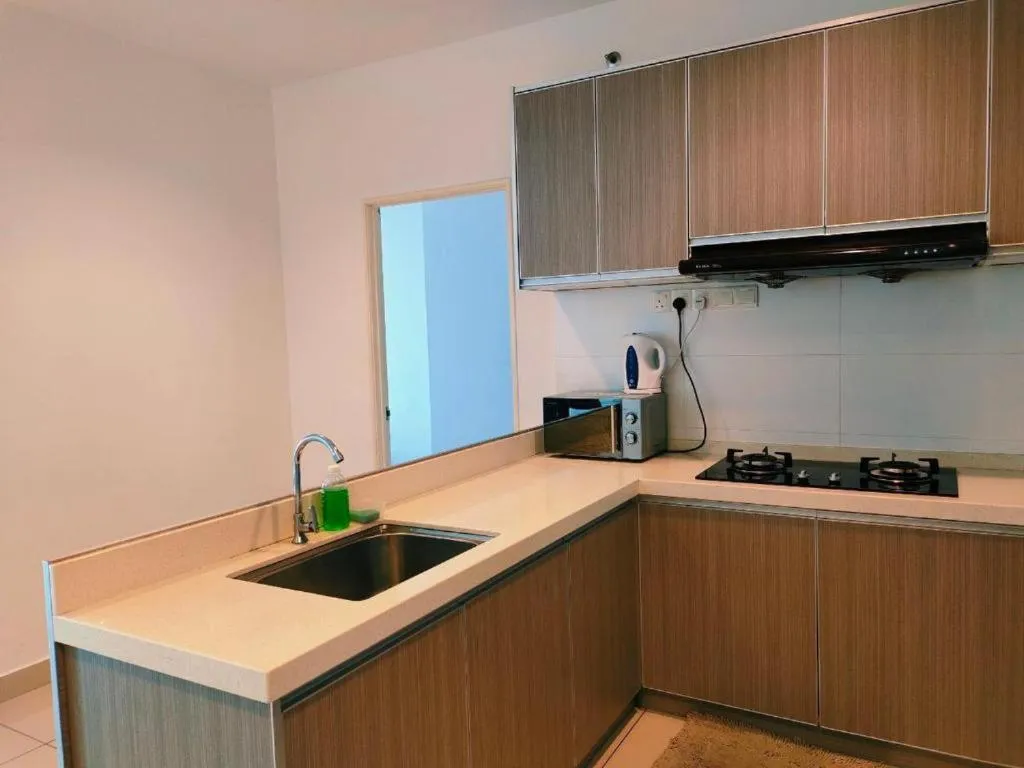 Kitchen or kitchenette in Merlene Suites at Mansion One Formerly know as Mansion One Suites