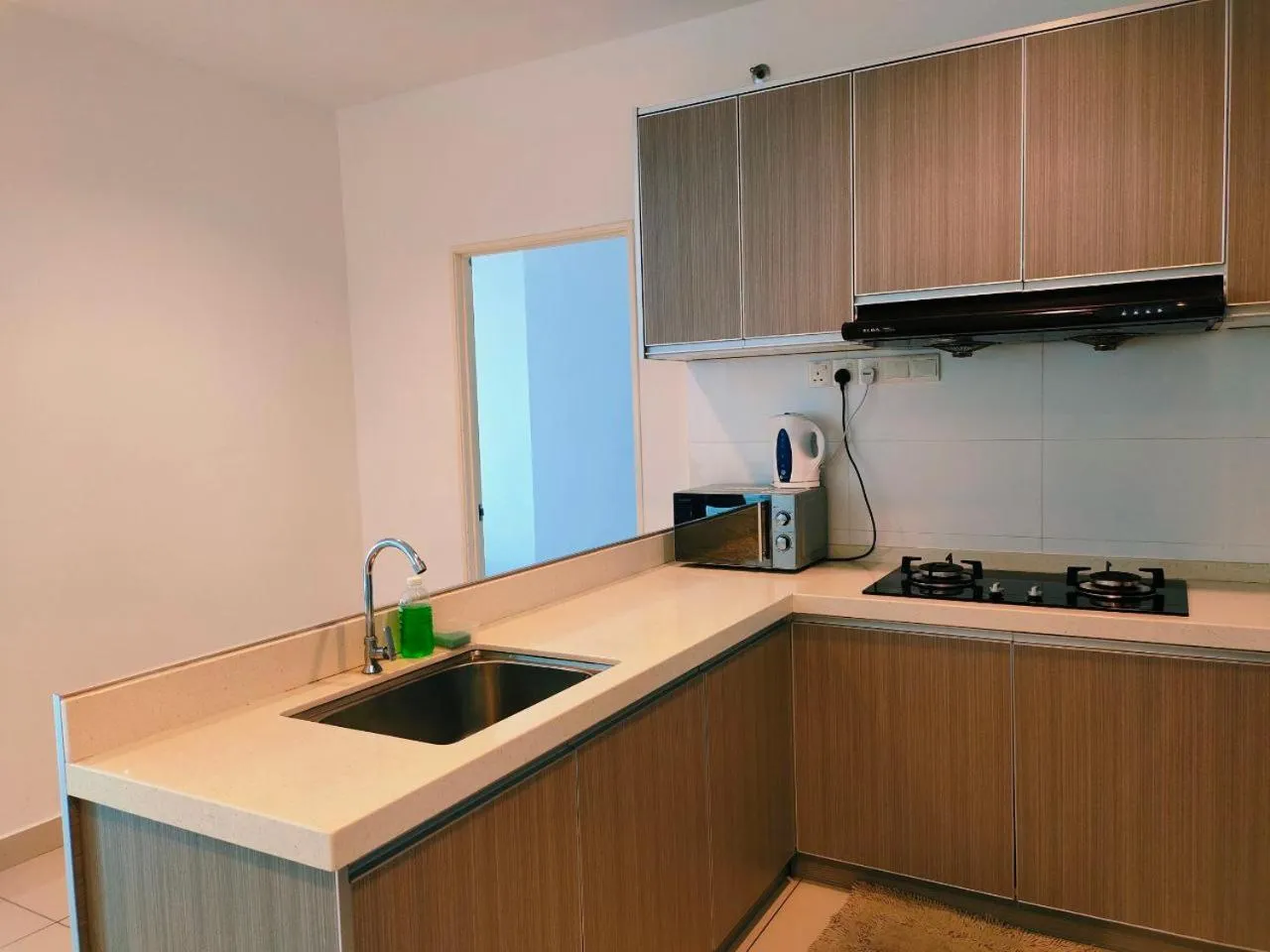 Kitchen or kitchenette in Merlene Suites at Mansion One Formerly know as Mansion One Suites