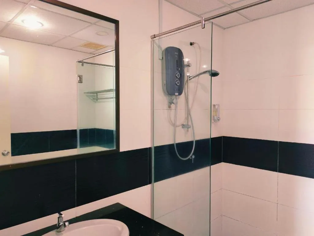 Shower in Merlene Suites at Mansion One Formerly know as Mansion One Suites