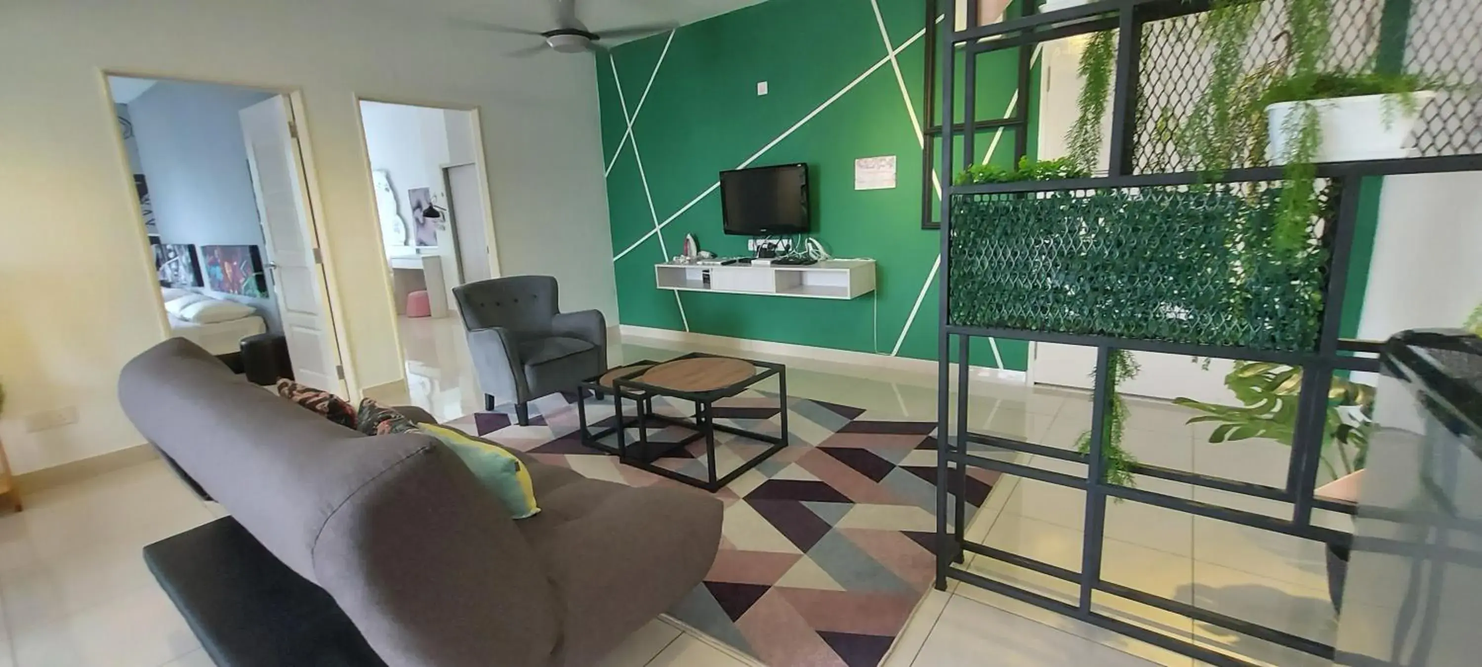 Living room in Merlene Suites at Mansion One Formerly know as Mansion One Suites Living room in Merlene Suites at Mansion One Formerly know as Mansion One Suites