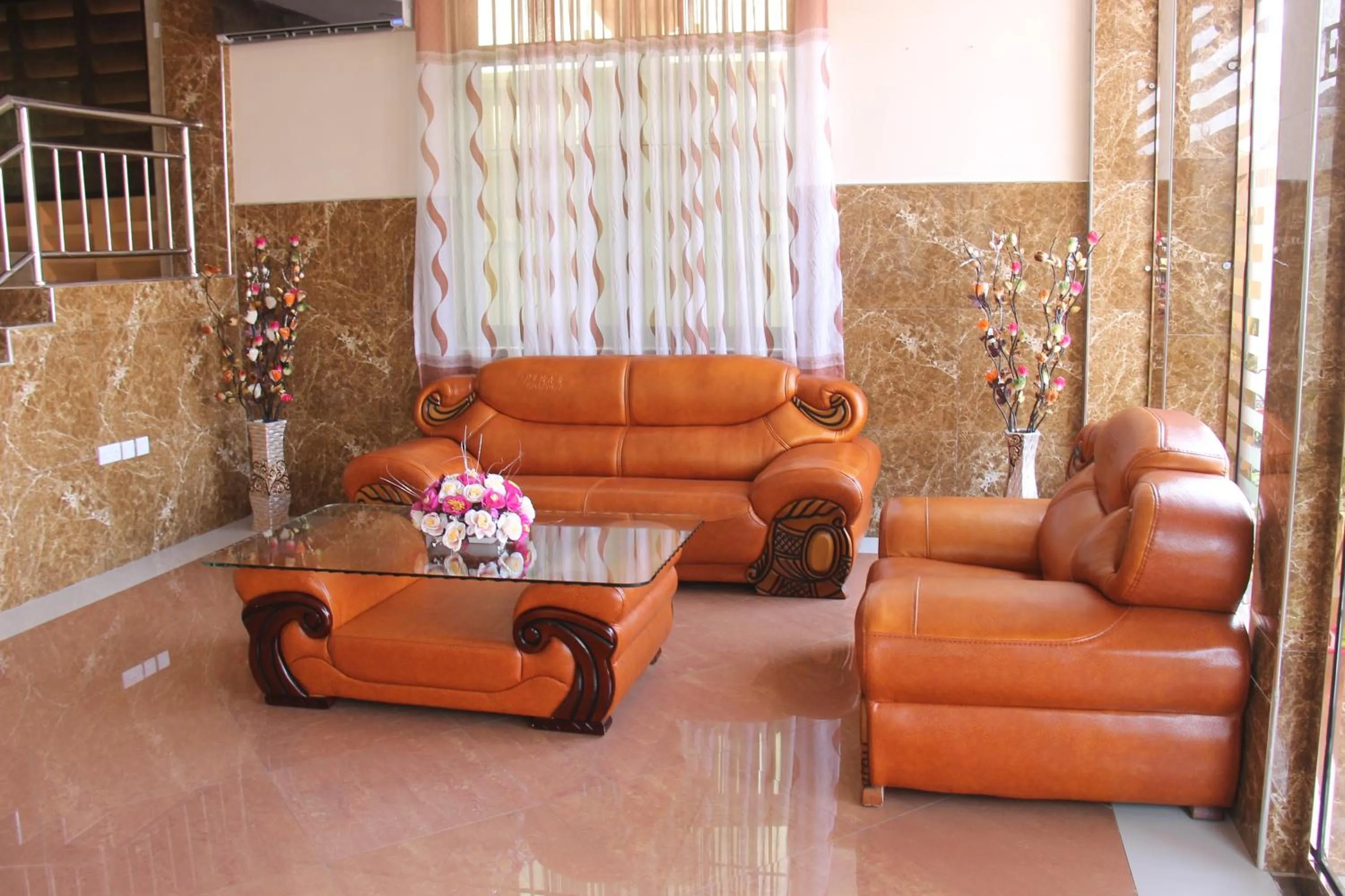 Communal lounge/ TV room in Silver Paradise Hotel