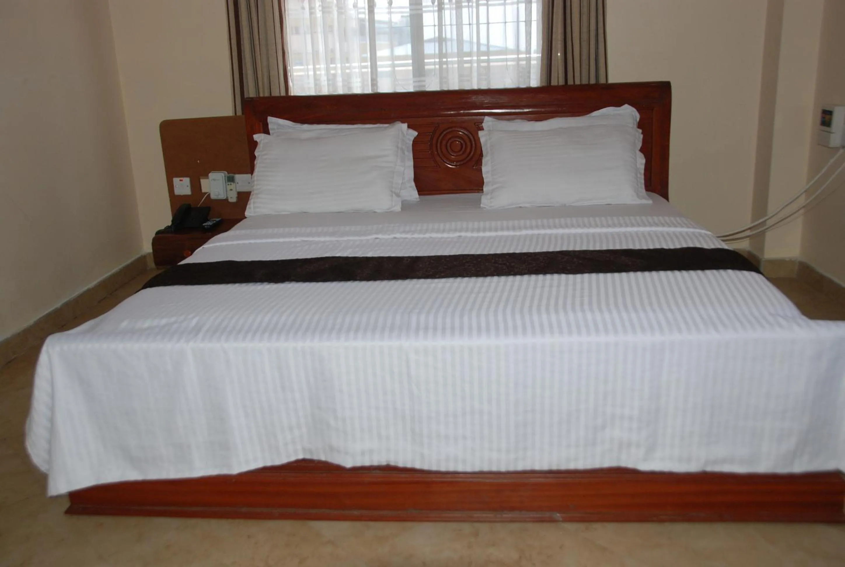 Bed in Silver Paradise Hotel