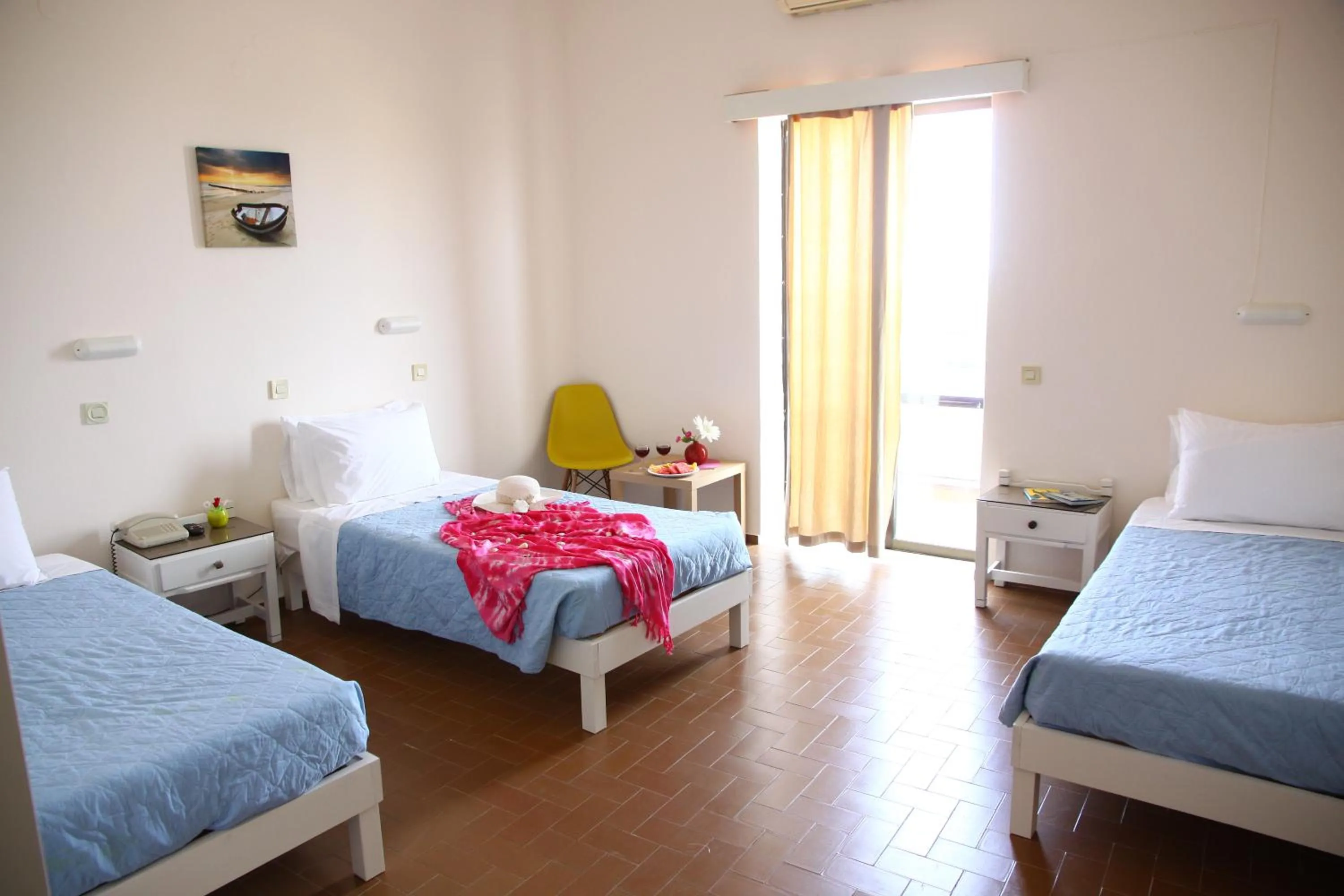 Bedroom in Triton Garden Hotel