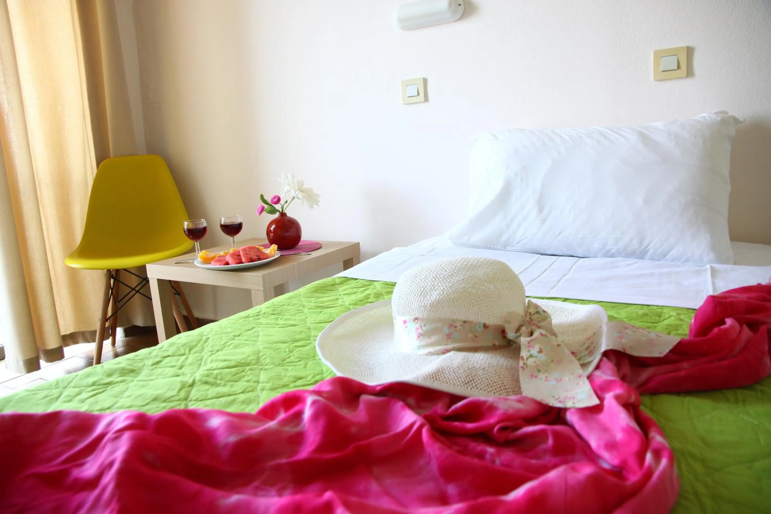 Bed in Triton Garden Hotel