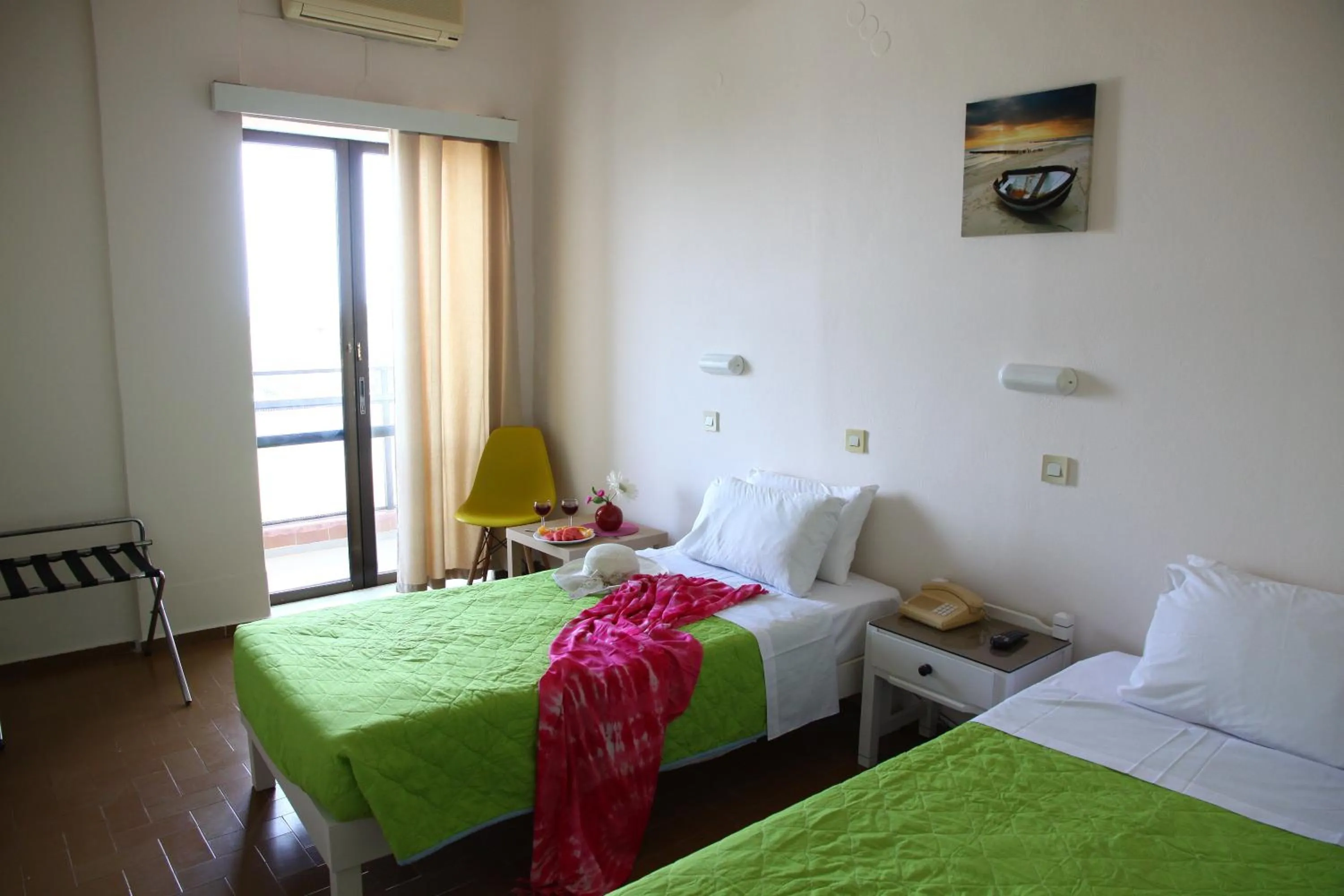 Bed in Triton Garden Hotel