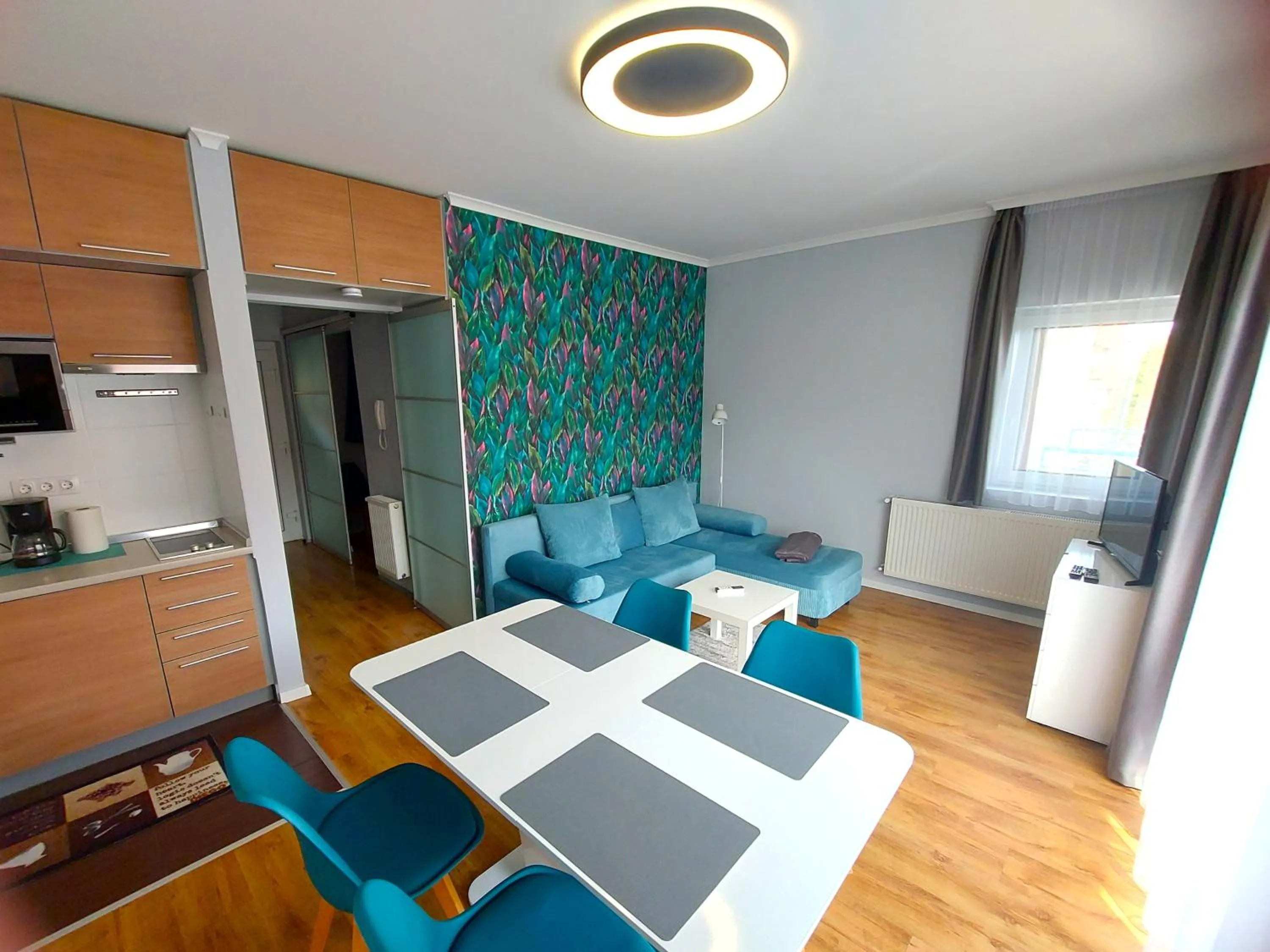 Living room, Bed in Cafe Relax Apartments
