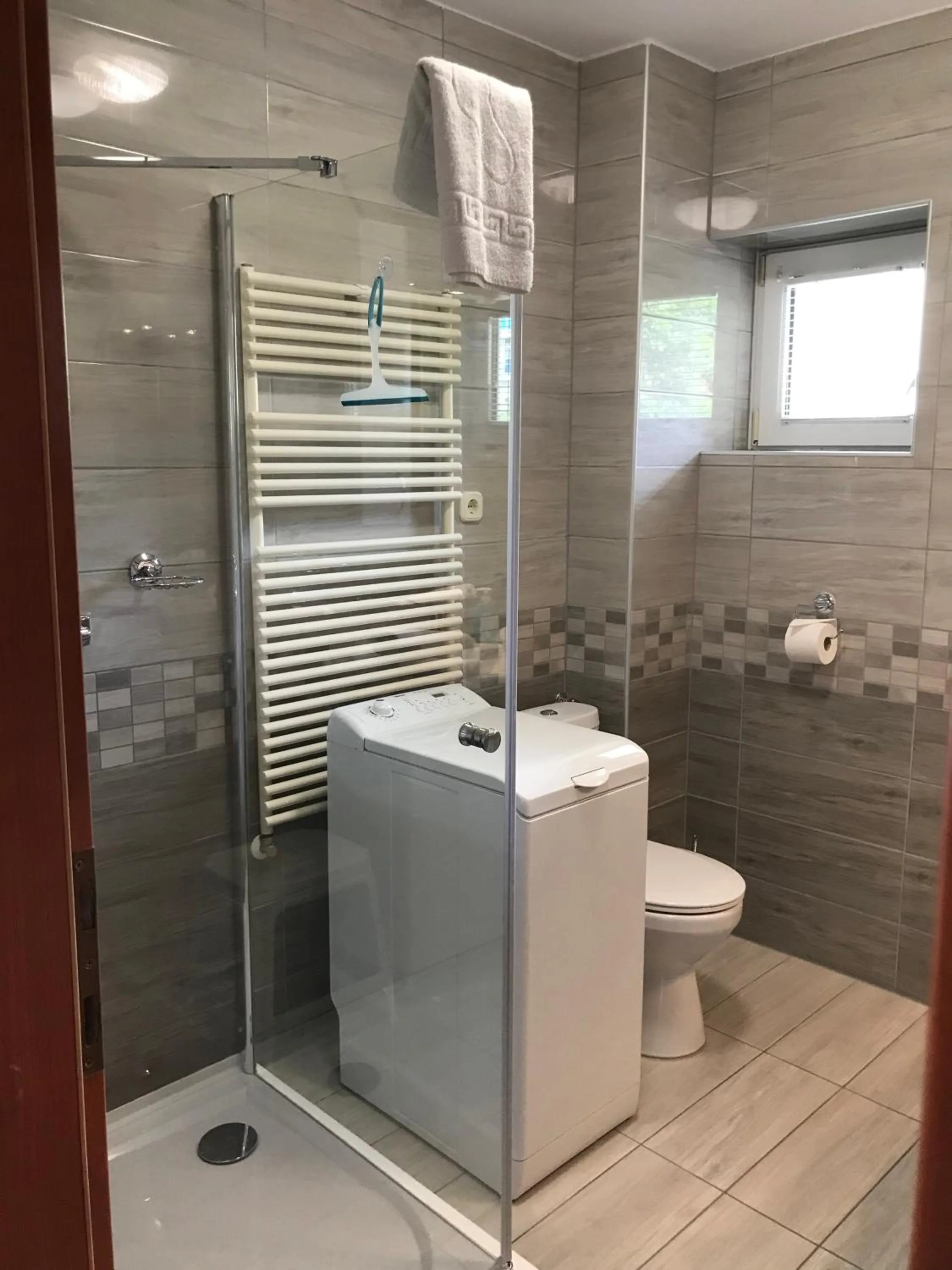 Shower in Cafe Relax Apartments