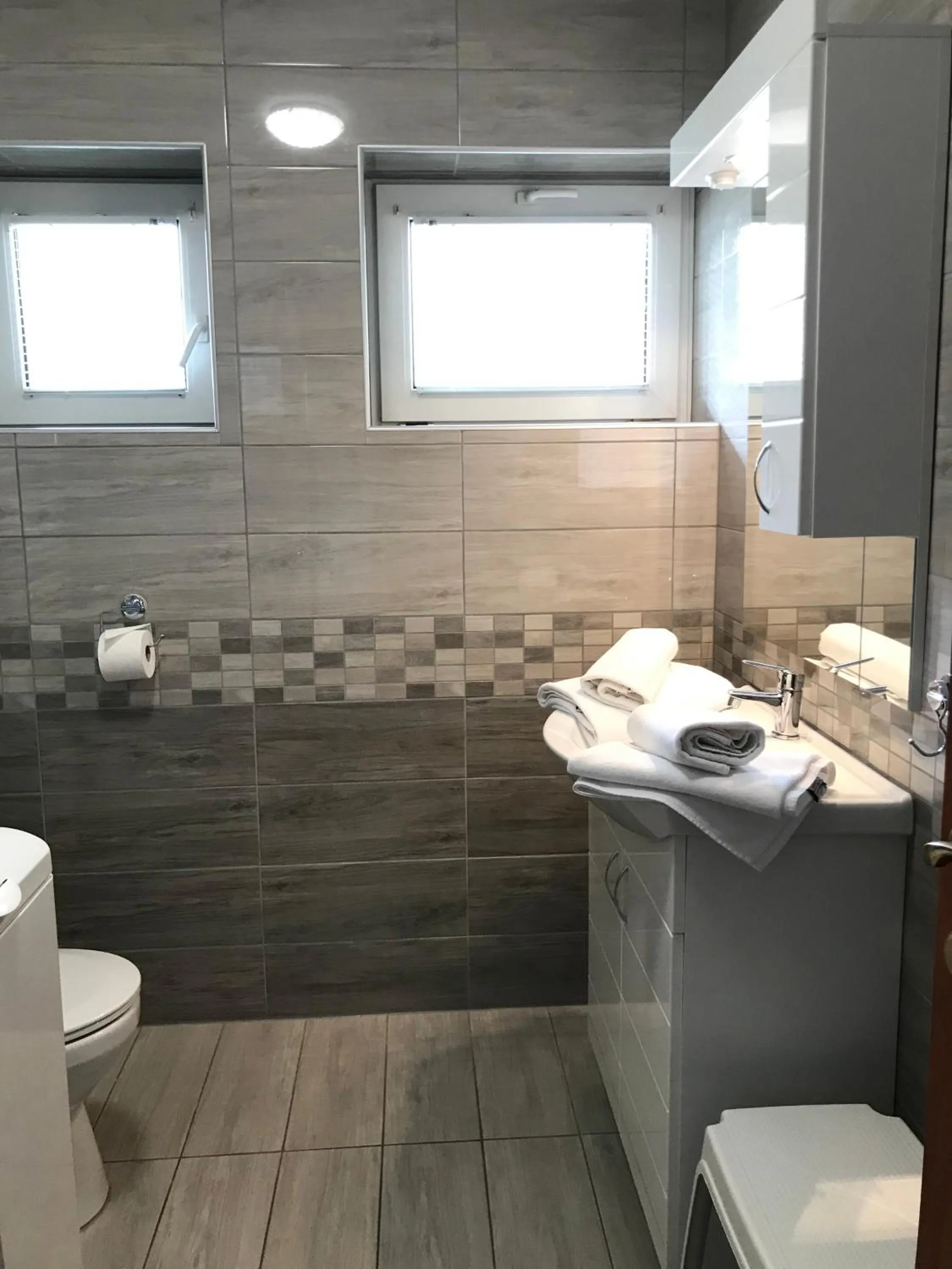Shower in Cafe Relax Apartments