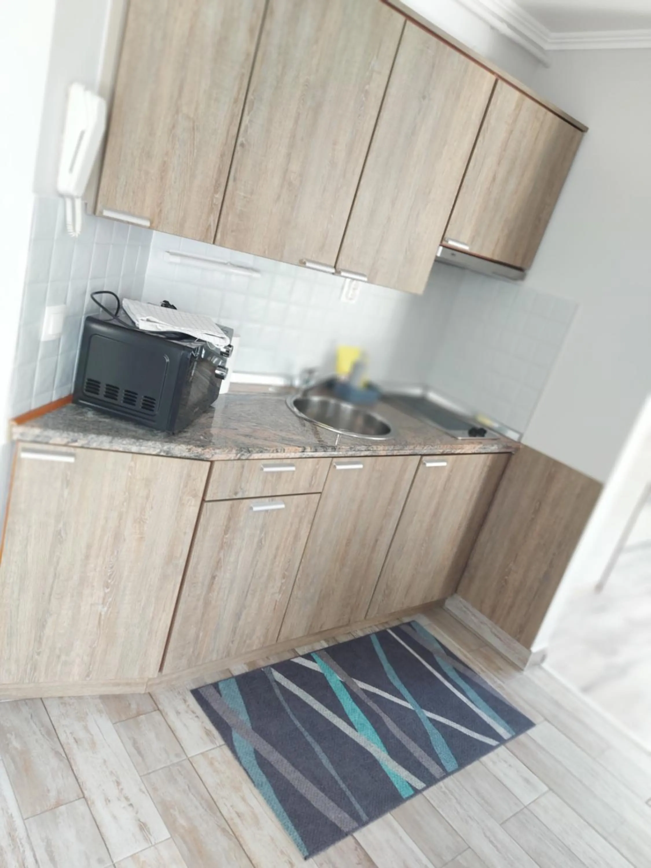 kitchen in Cafe Relax Apartments