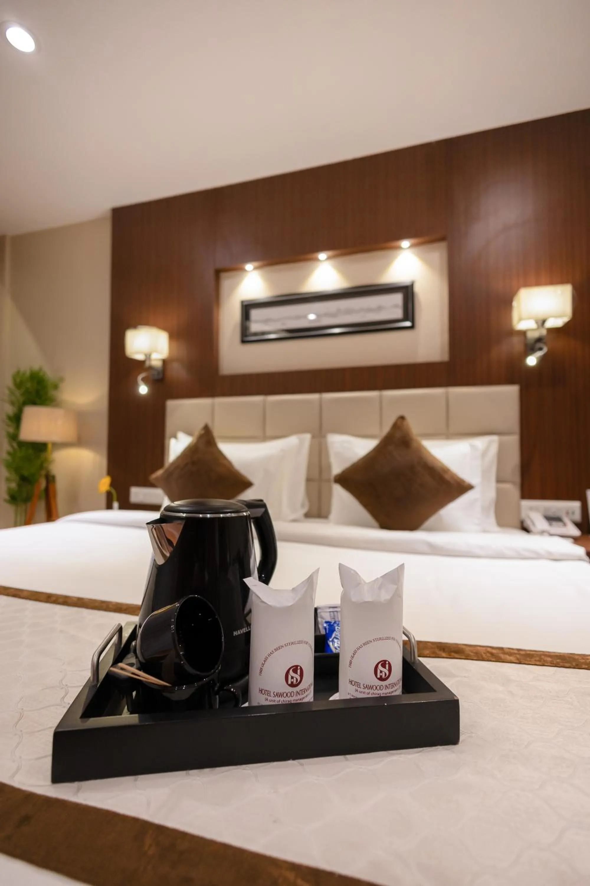 Coffee/tea facilities, Bed in Hotel Sawood International