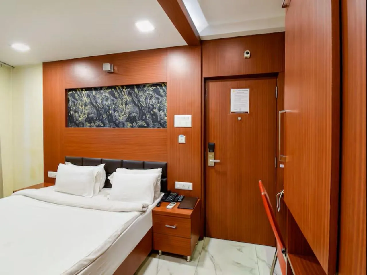 Bed in Hotel Sawood International