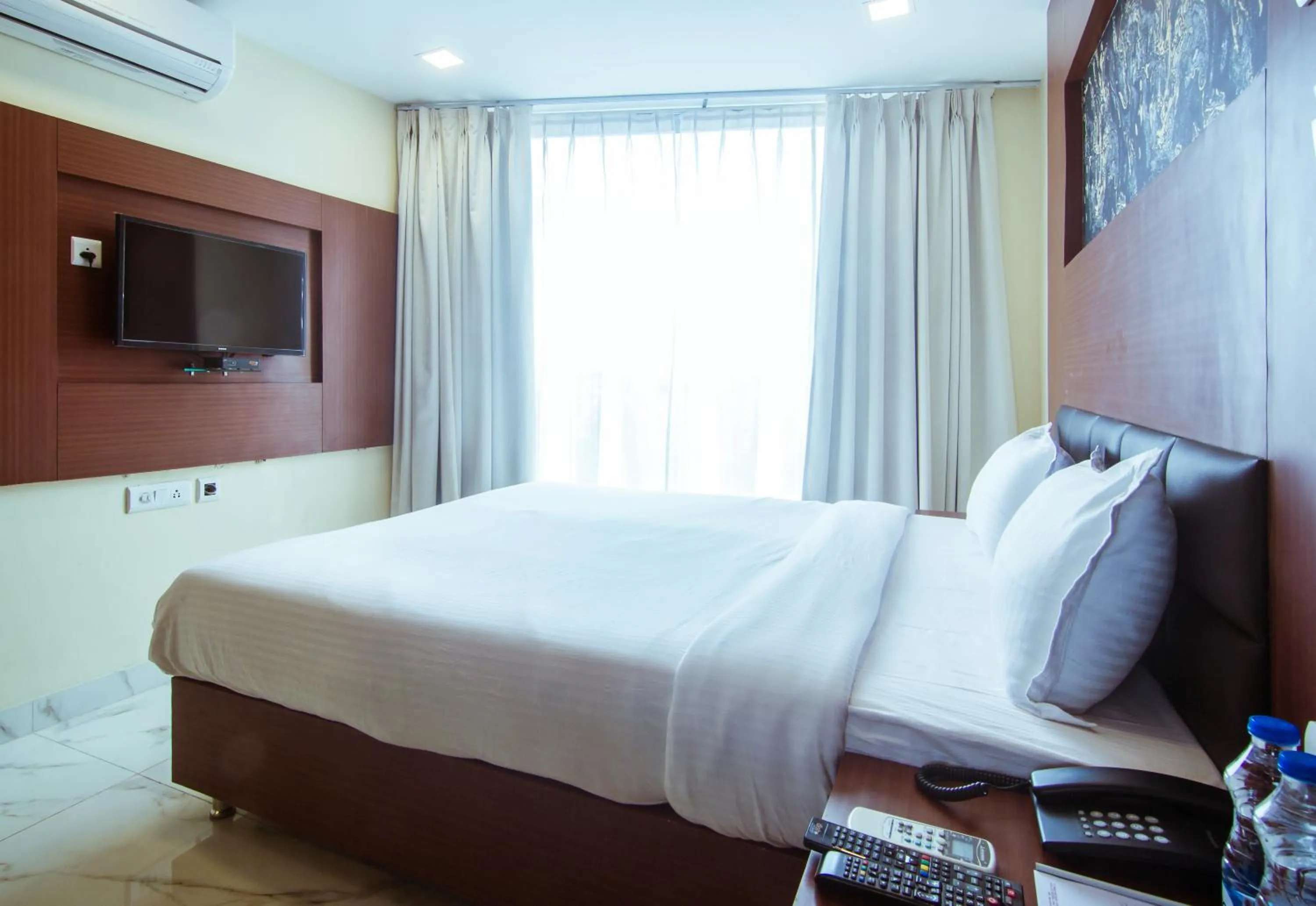 Bed in Hotel Sawood International