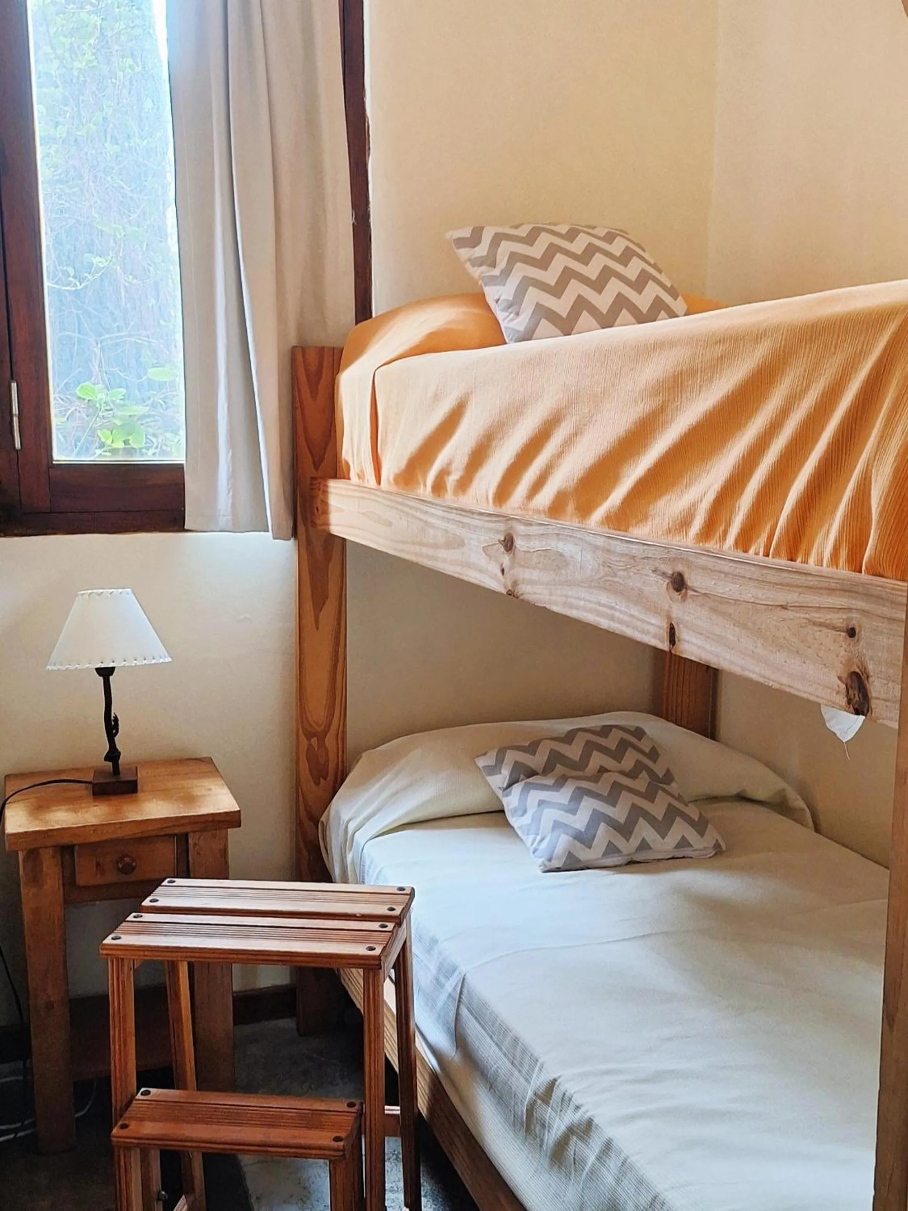 Bed in Altos Medanos Cabañas & Club de Bosque