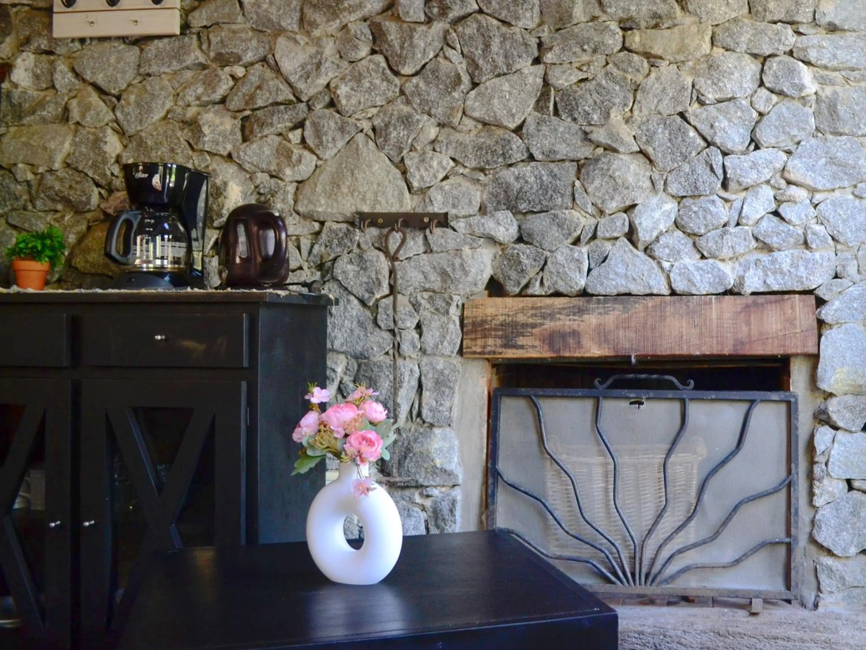 fireplace in Altos Medanos Cabañas & Club de Bosque