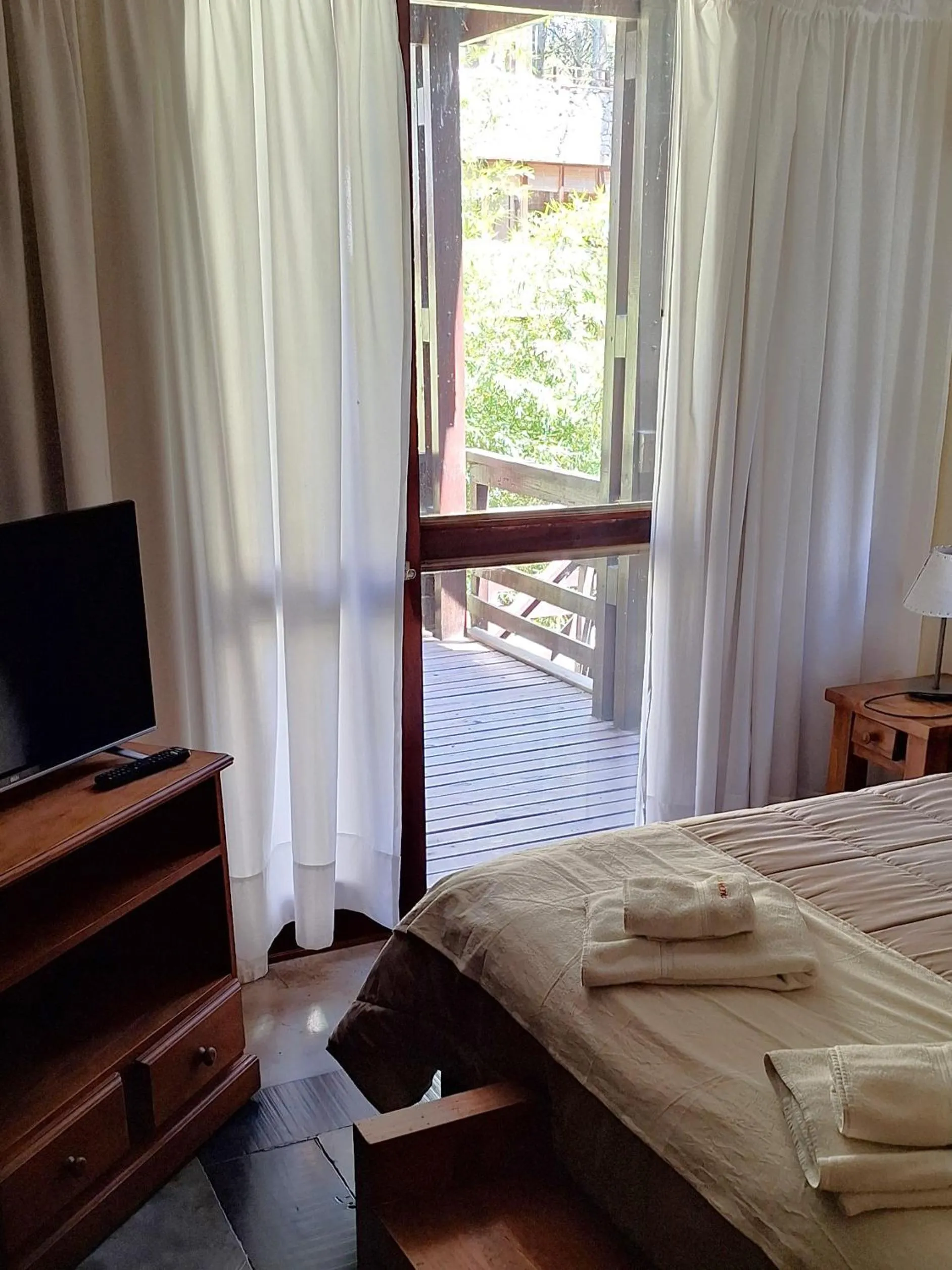 Bed in Altos Medanos Cabañas & Club de Bosque