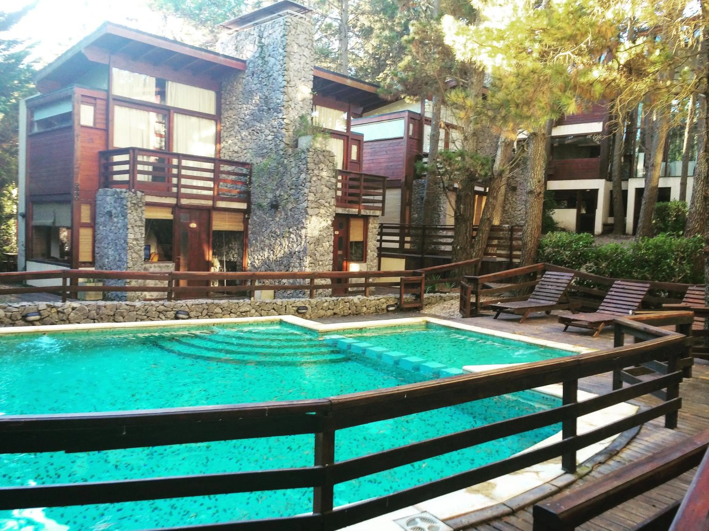 Swimming pool in Altos Medanos Cabañas & Club de Bosque