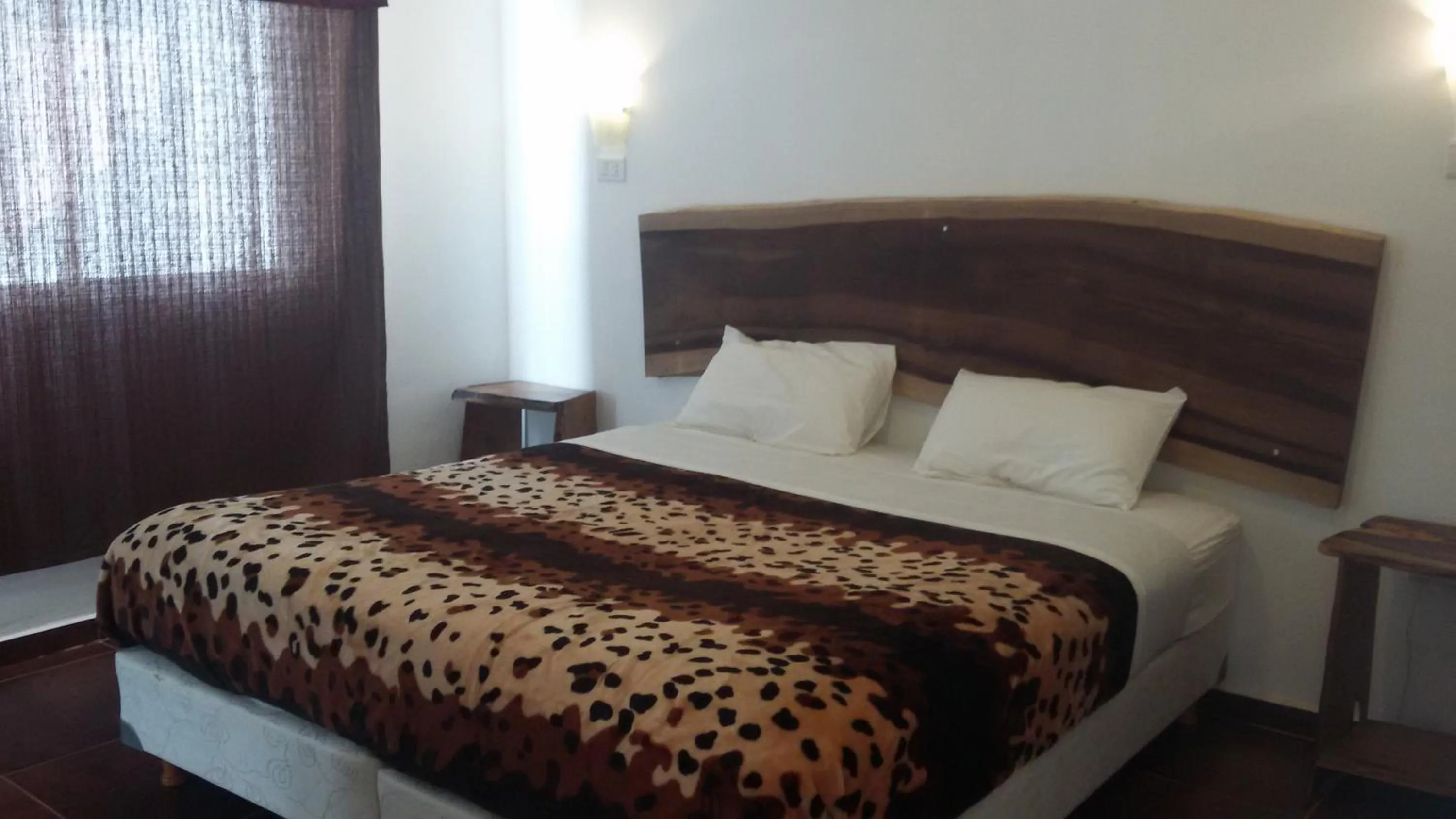 Decorative detail, Bed in Kelta Hotel Puerto Iguazú CENTRO