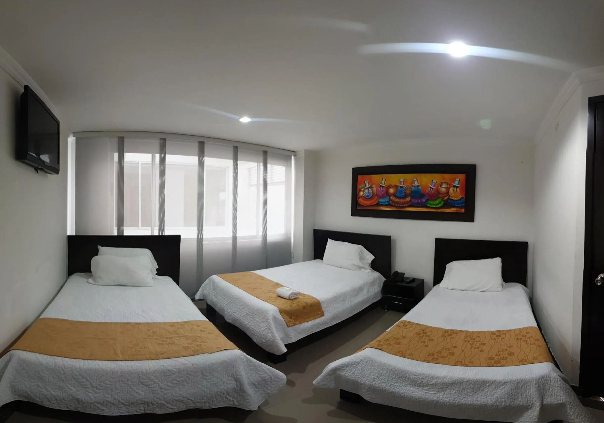 Photo of the whole room, Bed in Hotel Andinos Plaza Pitalito