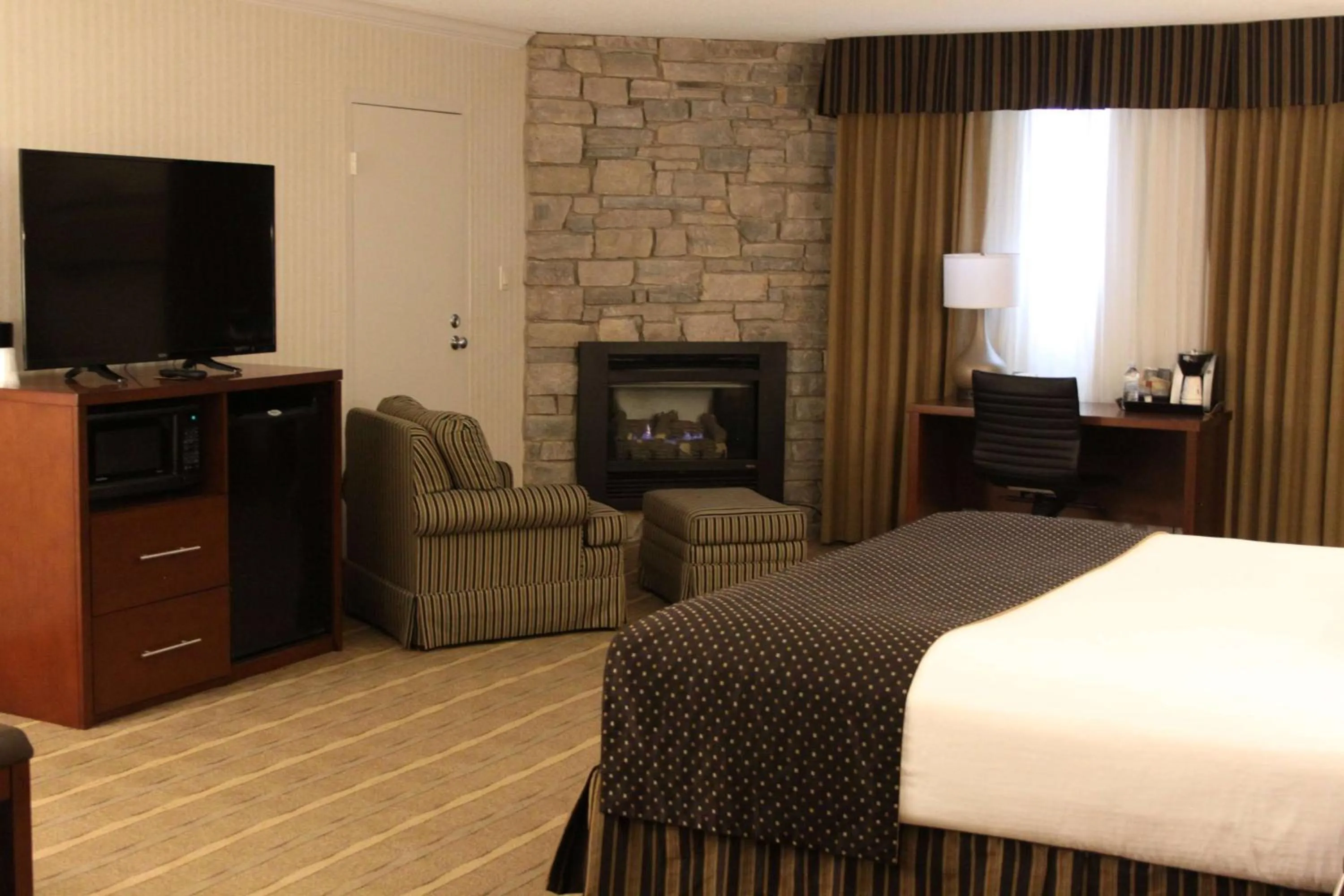 Photo of the whole room, Bed in Wyndham Garden Warsaw